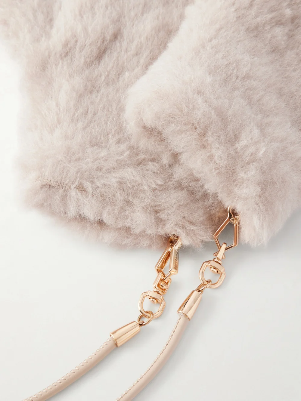 Close-up detail of the Max Mara Ombrato Strap-detailed Alpaca, Wool and Silk-blend Gloves
