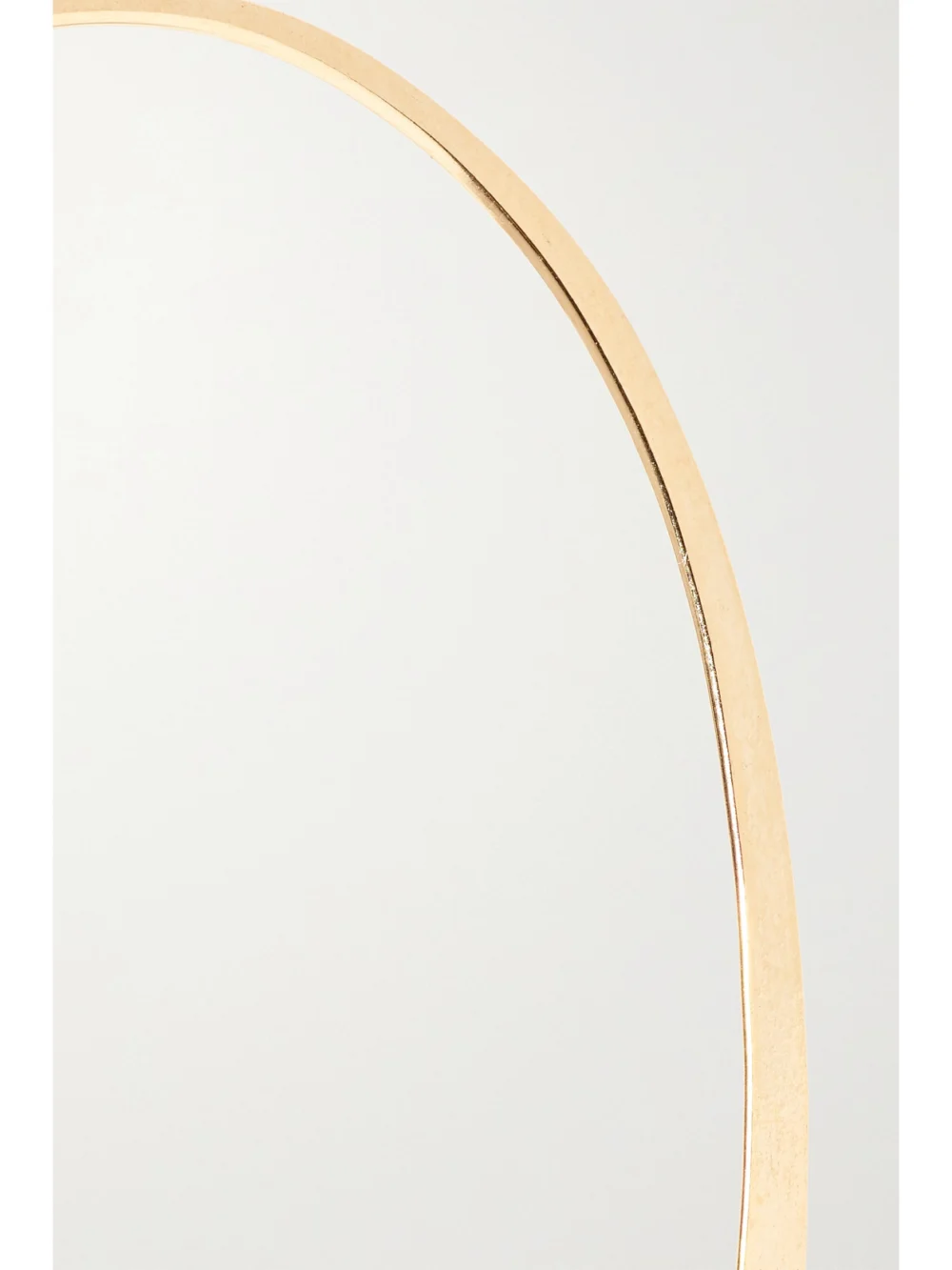 Close-up detail of the Melissa Joy Manning 14-karat Gold Hoop Earrings
