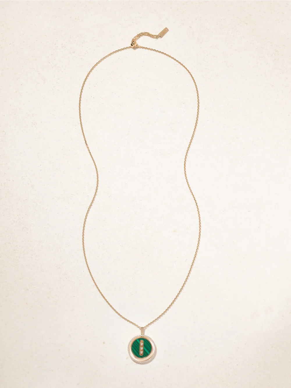 Close-up detail of the Messika Lucky Move 18-karat Gold, Malachite and Diamond Necklace