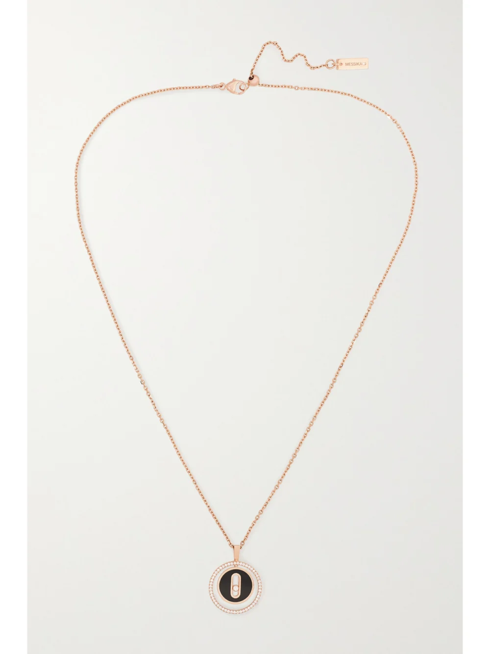 Close-up detail of the Messika Lucky Move 18-karat Rose Gold, Onyx and Diamond Necklace