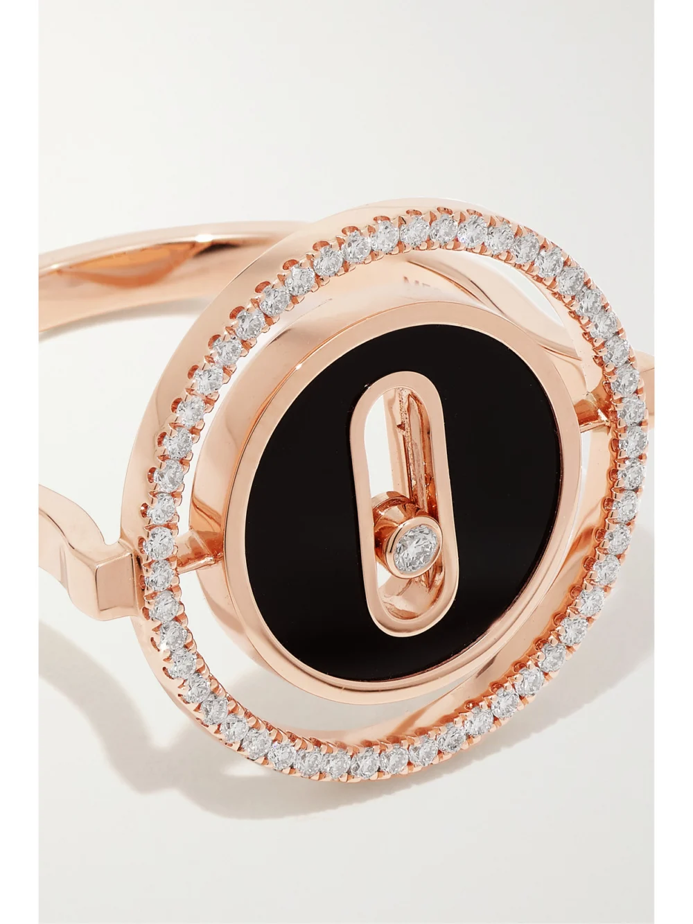 Close-up detail of the Messika Lucky Move 18-karat Rose Gold, Onyx and Diamond Ring
