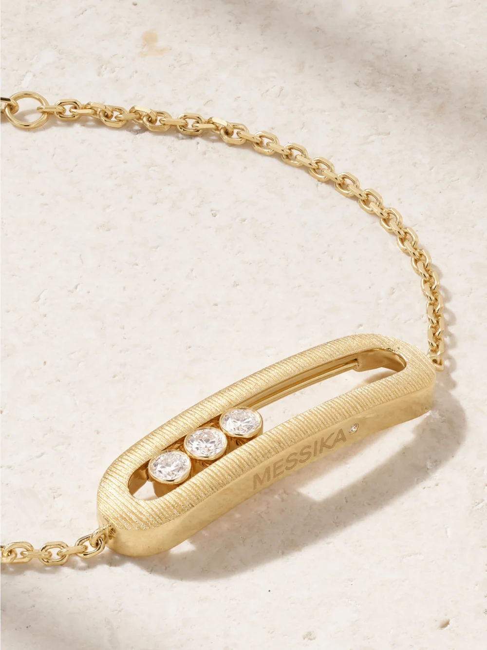 Close-up detail of the Messika Move Classique Ciselé 18-karat Gold Diamond Bracelet