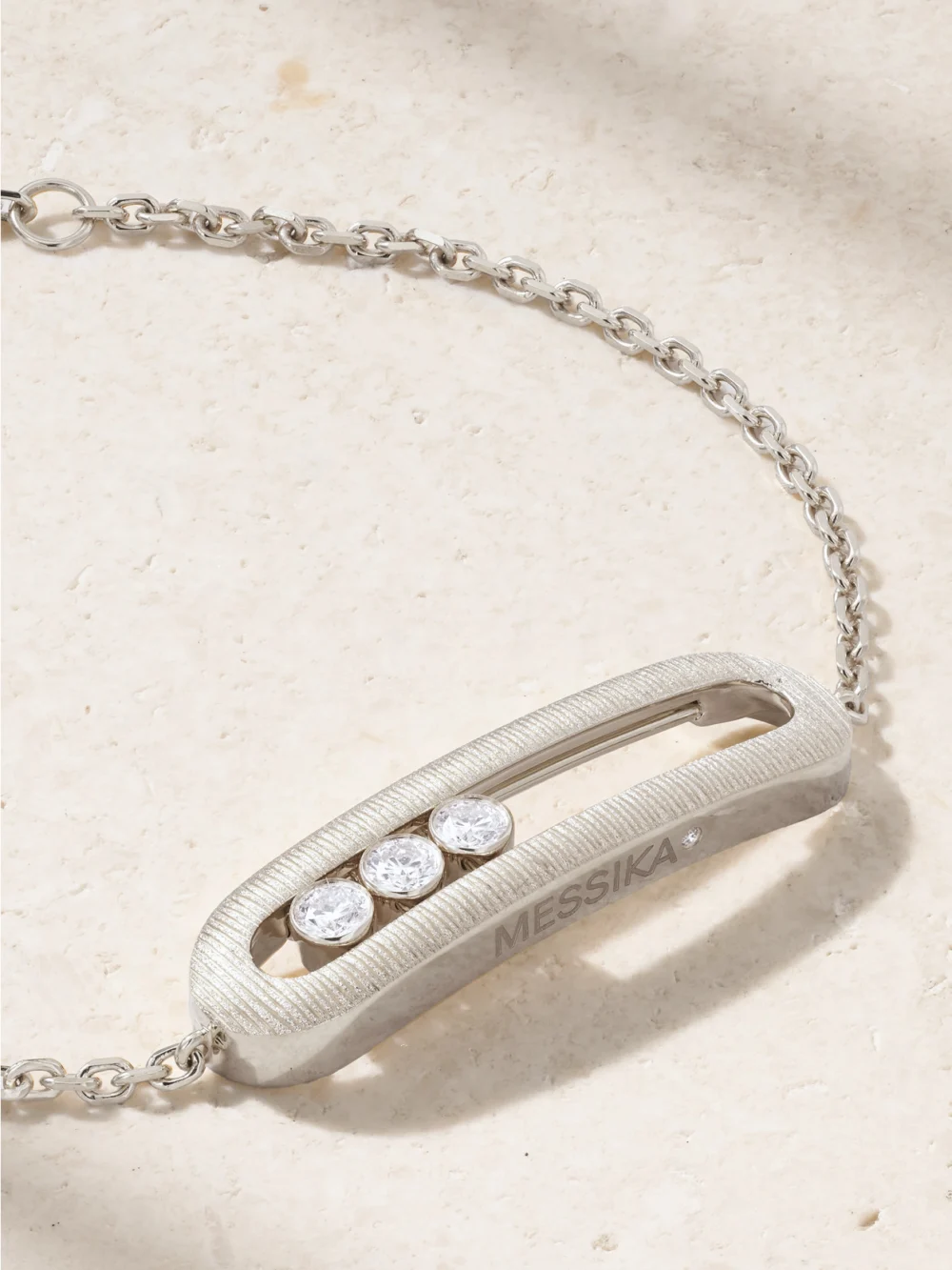 Close-up detail of the Messika Move Classique Ciselé 18-karat White Gold Diamond Bracelet