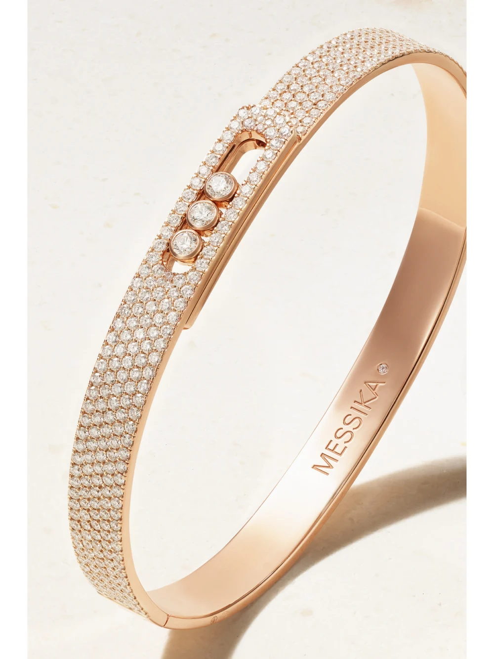 Close-up detail of the Messika Move Noa 18-karat Rose Gold Diamond Bracelet