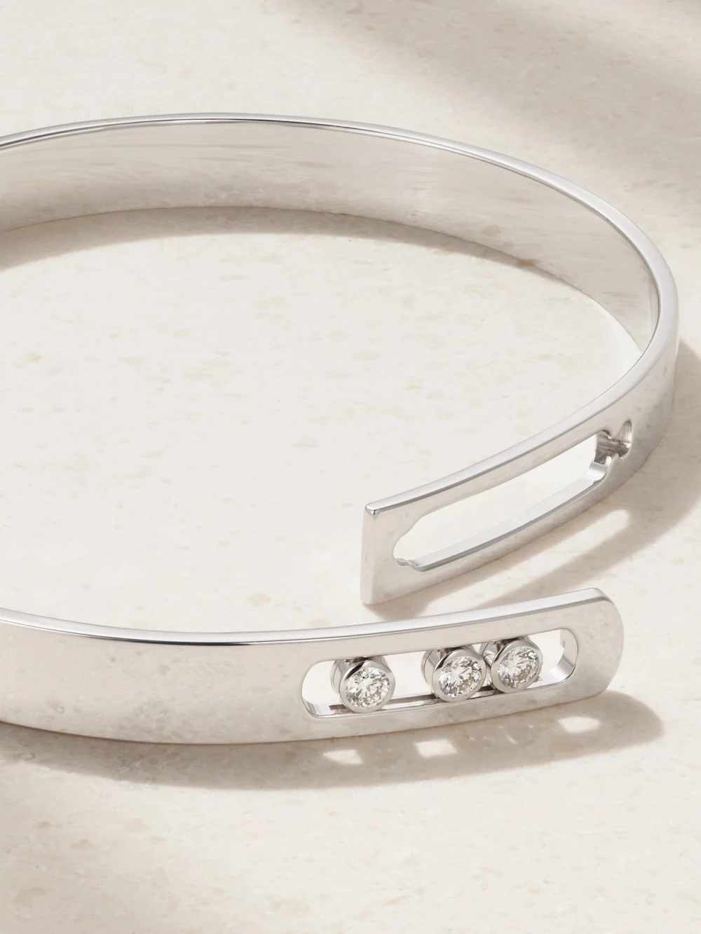 Close-up detail of the Messika Move Noa 18-karat White Gold Diamond Bangle