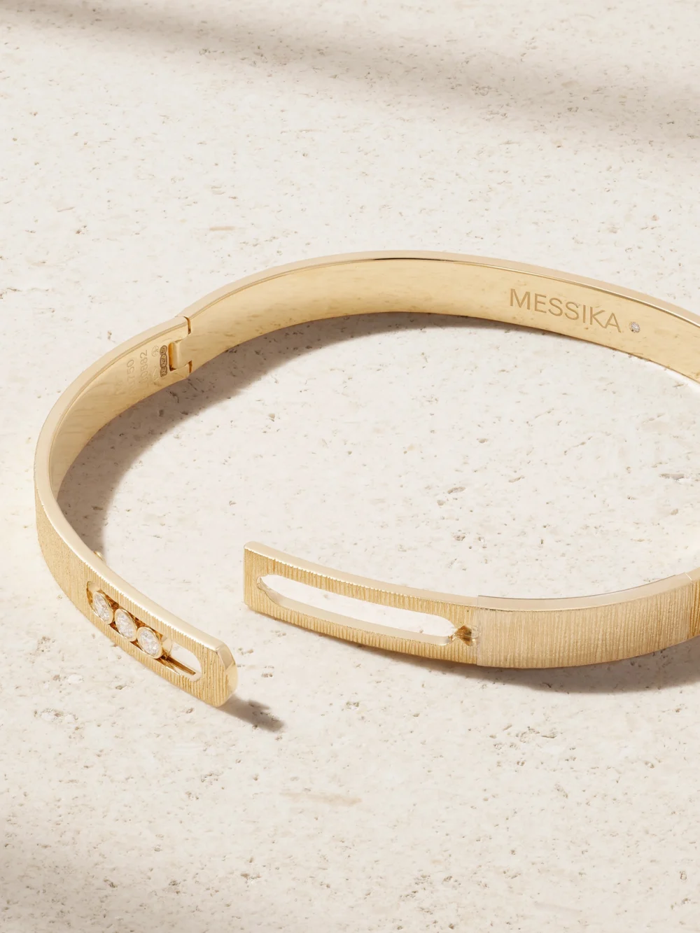 Back view of the Messika Move Noa Ciselé 14-karat Gold Diamond Bangle