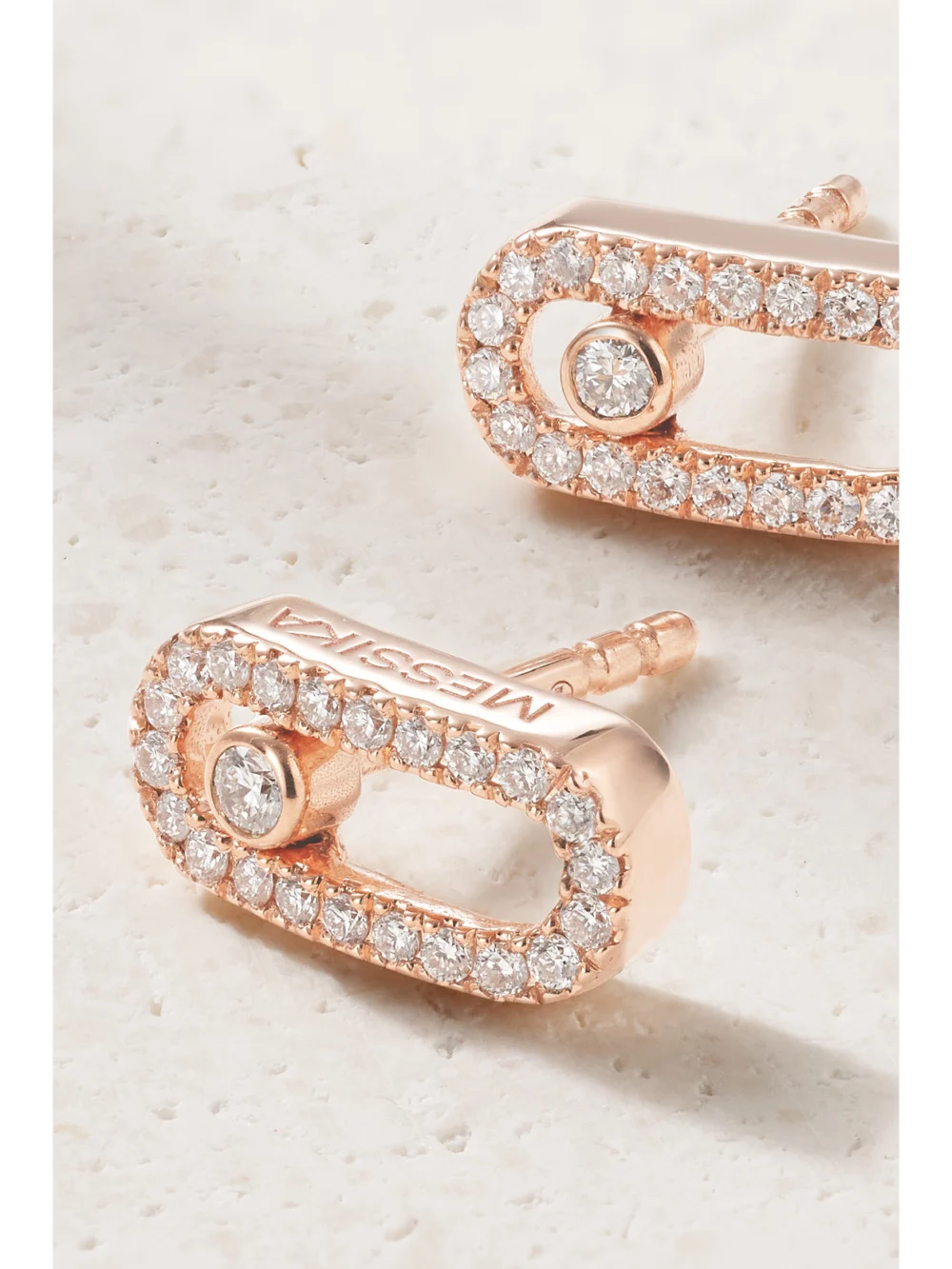 Close-up detail of the Messika Move Uno 18-karat Rose Gold Diamond Earrings