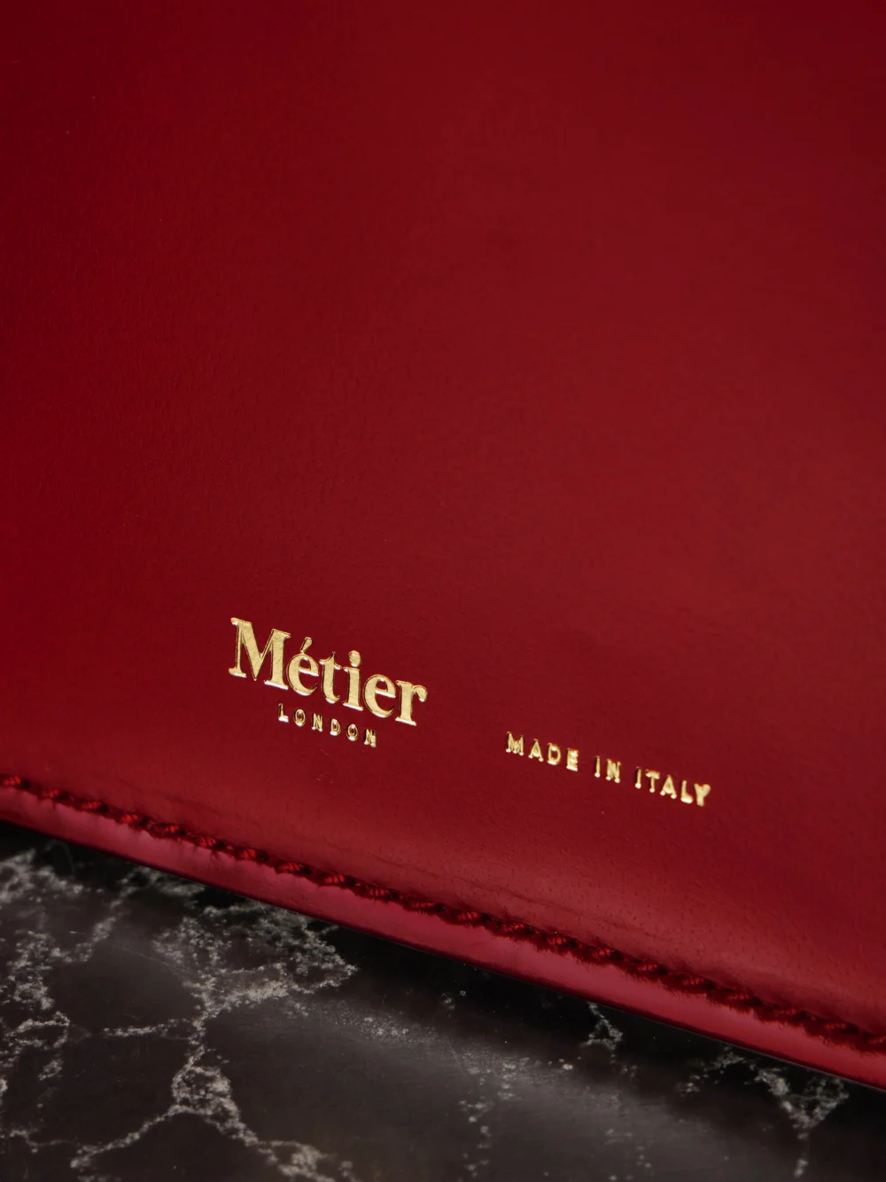 Close-up detail of the Métier Parallel 22 Leather Shoulder Bag