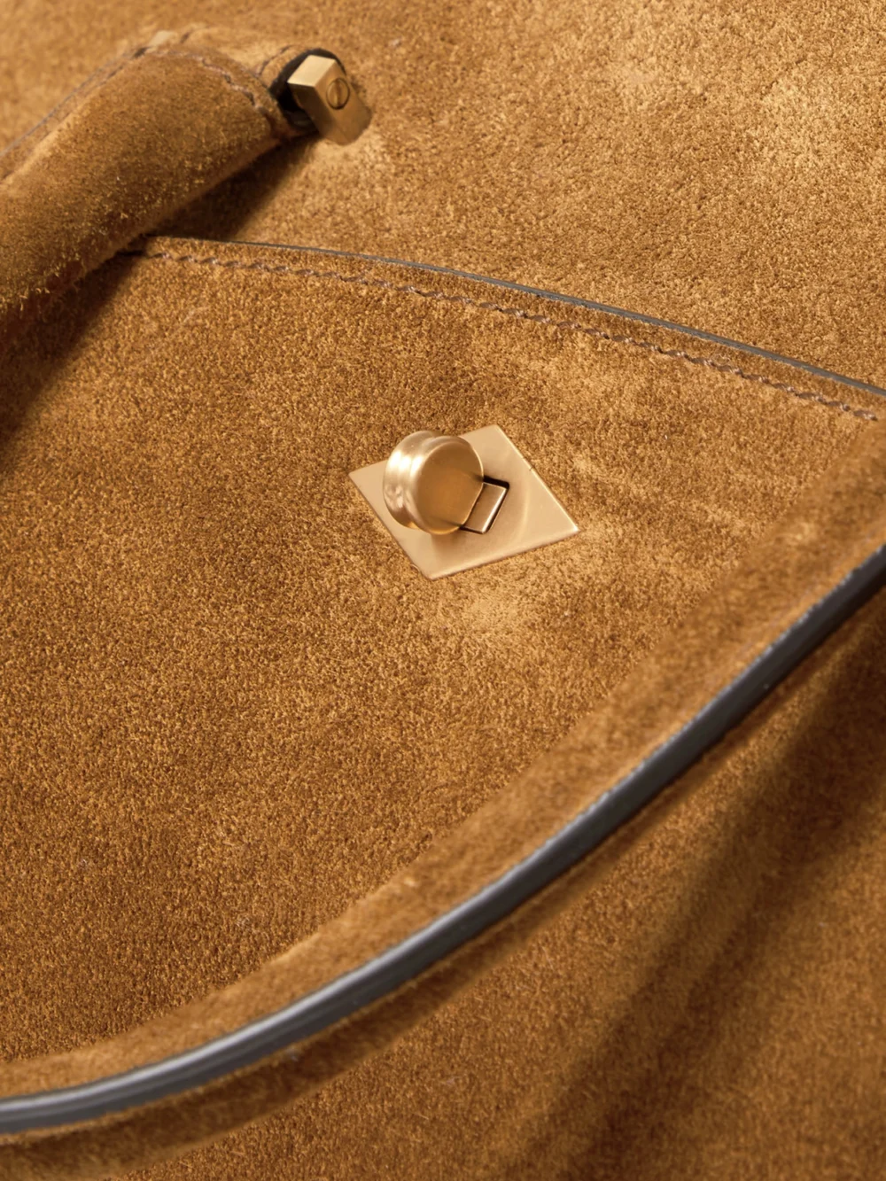 Close-up detail of the Métier Private Eye Medium Suede Tote