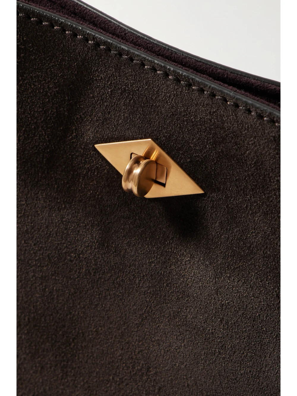 Close-up detail of the Métier Stowaway Suede Shoulder Bag