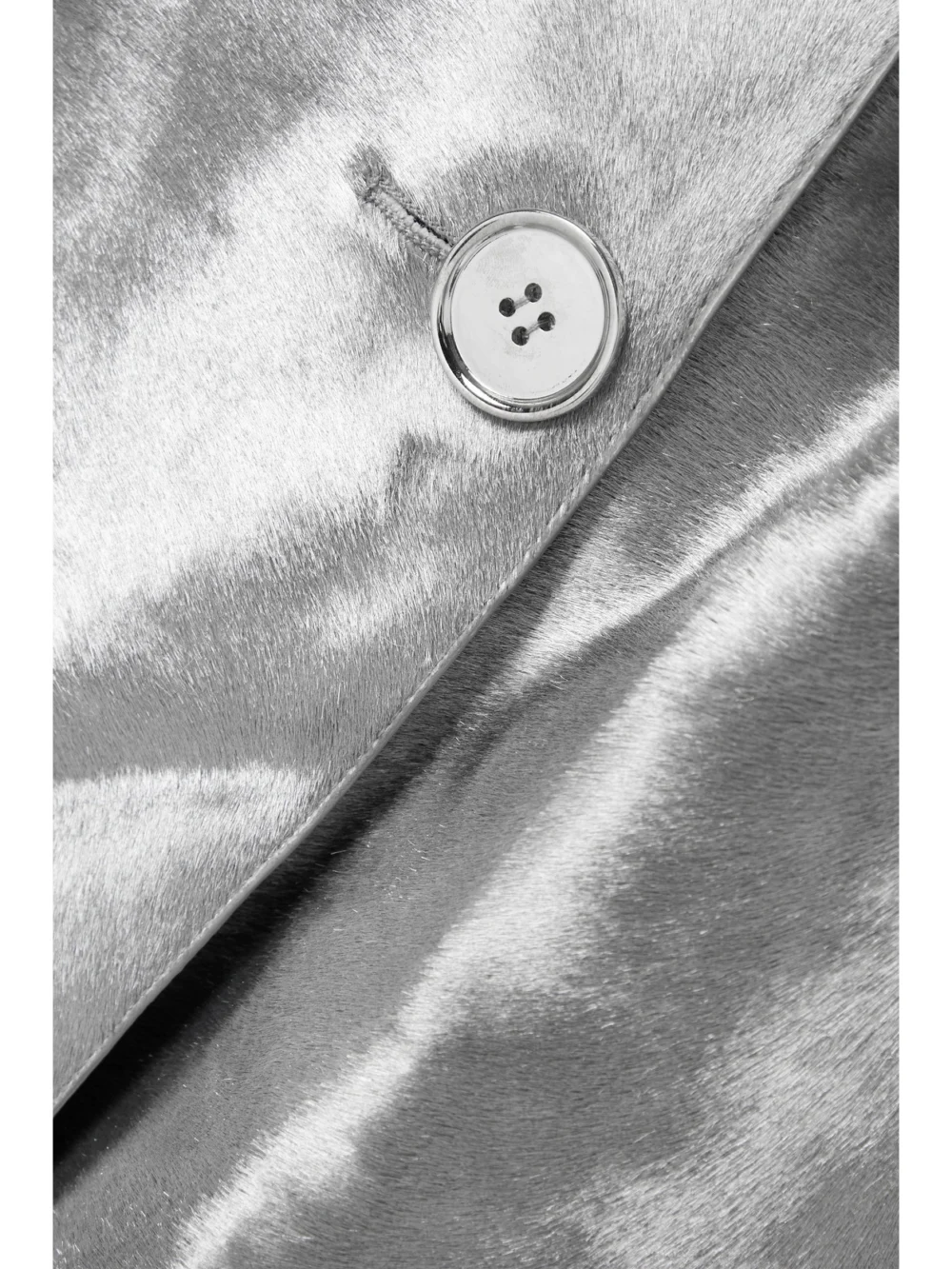 Close-up detail of the Michael Kors Collection Belted Double-breasted Metallic Calf Hair Trench Coat