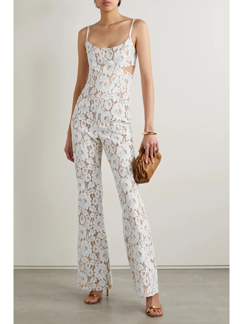 Michael Kors Collection Cutout Satin-trimmed Cotton-blend Corded Lace Jumpsuit, worn by a model