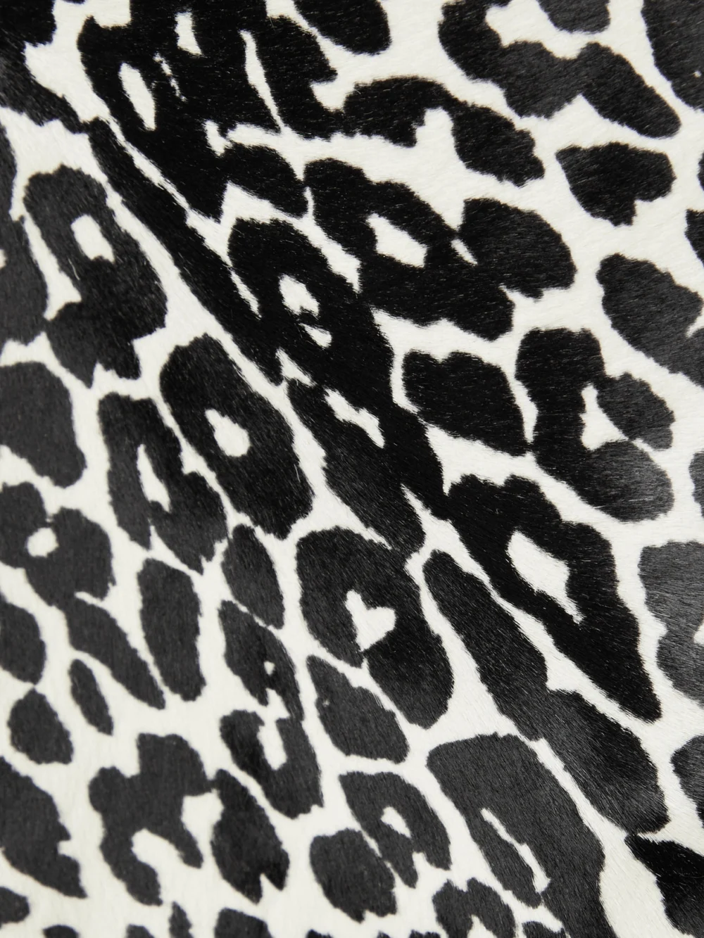 Close-up detail of the Michael Kors Collection Leopard-print Calf Hair Mini Skirt