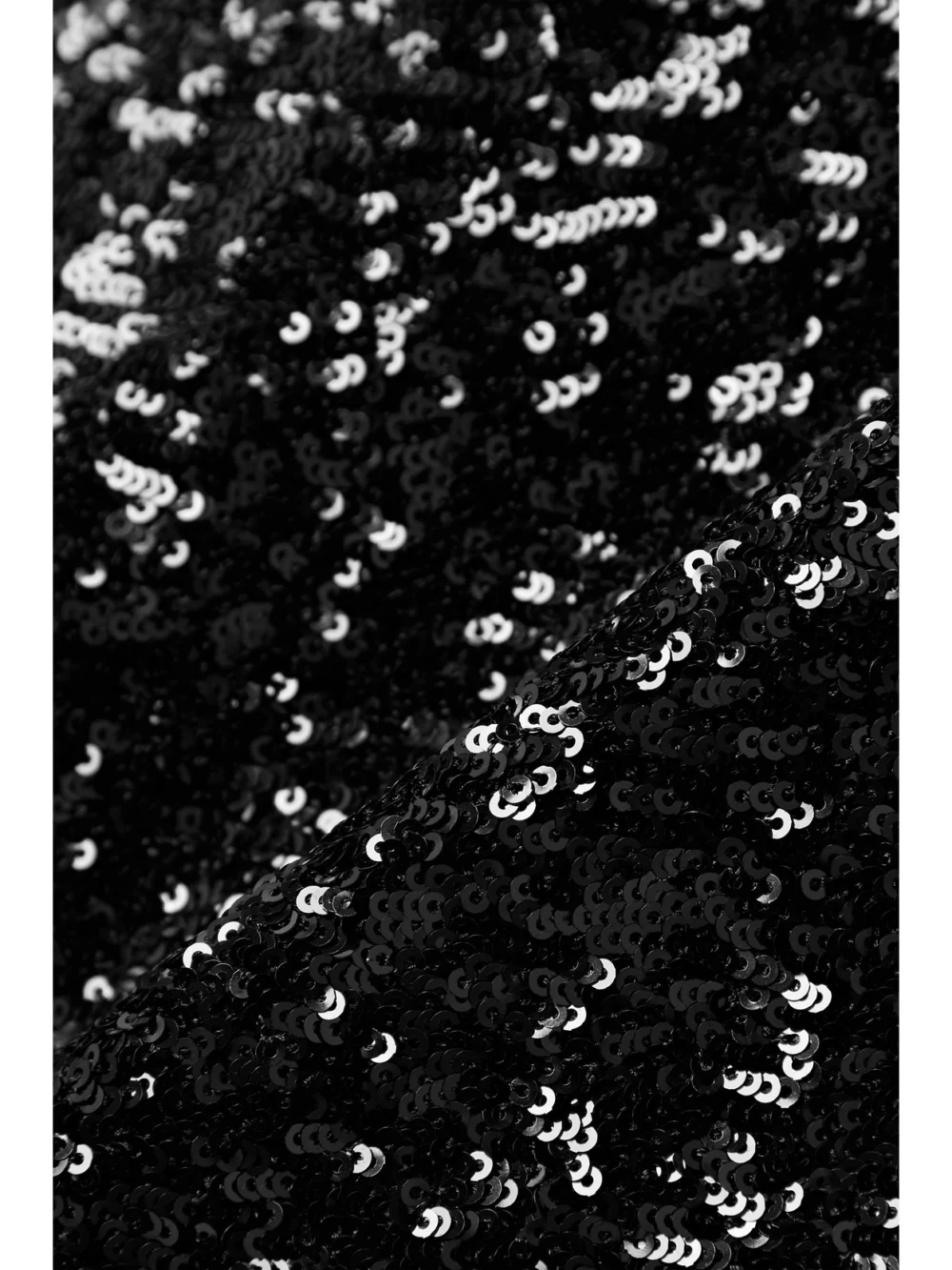 Close-up detail of the Michael Kors Collection One-shoulder Sequined Tulle Mini Dress