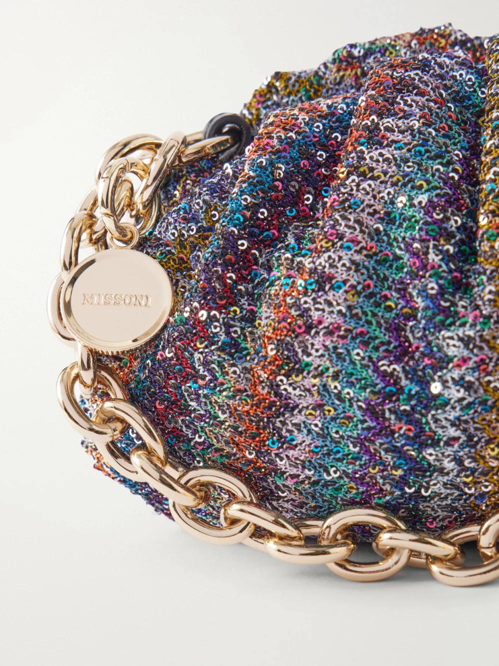 Close-up detail of the Missoni Caperdoni Sequined Striped Crochet-knit Shoulder Bag