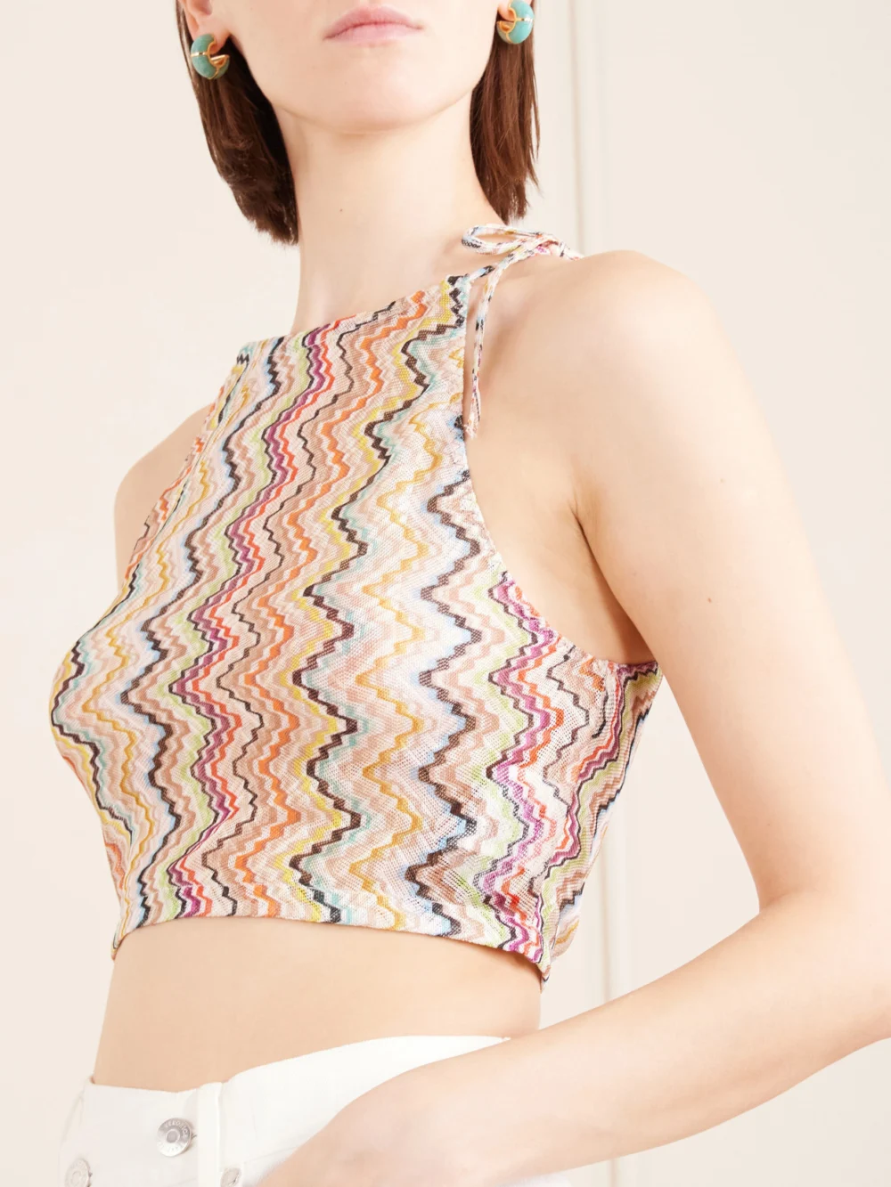 Close-up detail of the Missoni Cropped Gathered Striped Mesh Halterneck Top