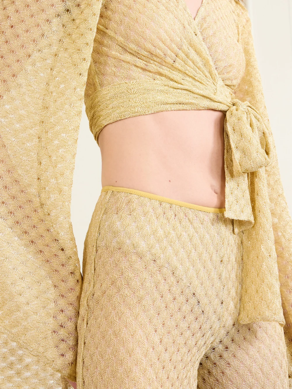 Close-up detail of the Missoni Cropped Metallic Crochet-knitted Wrap Top