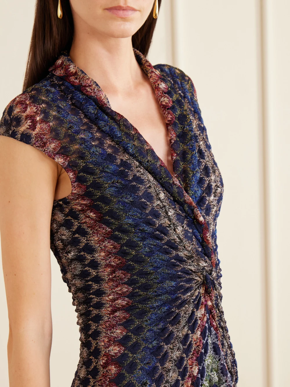 Close-up detail of the Missoni Gathered Striped Metallic Crochet-knit Maxi Dress