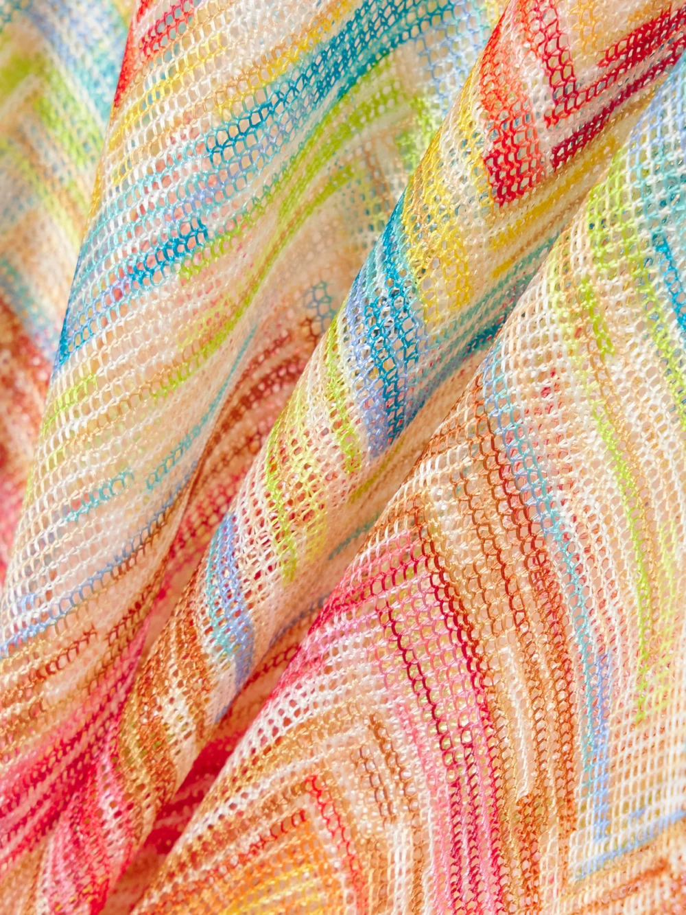 Close-up detail of the Missoni Mare Cropped Striped Metallic Crochet-knit Top