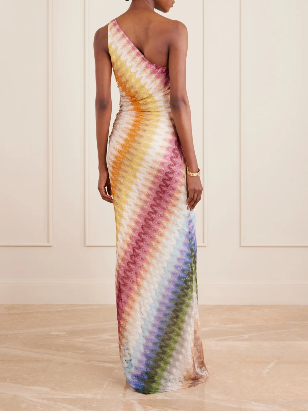 Back view of the Missoni One-shoulder Striped Ruched Crochet-knit Maxi Dress