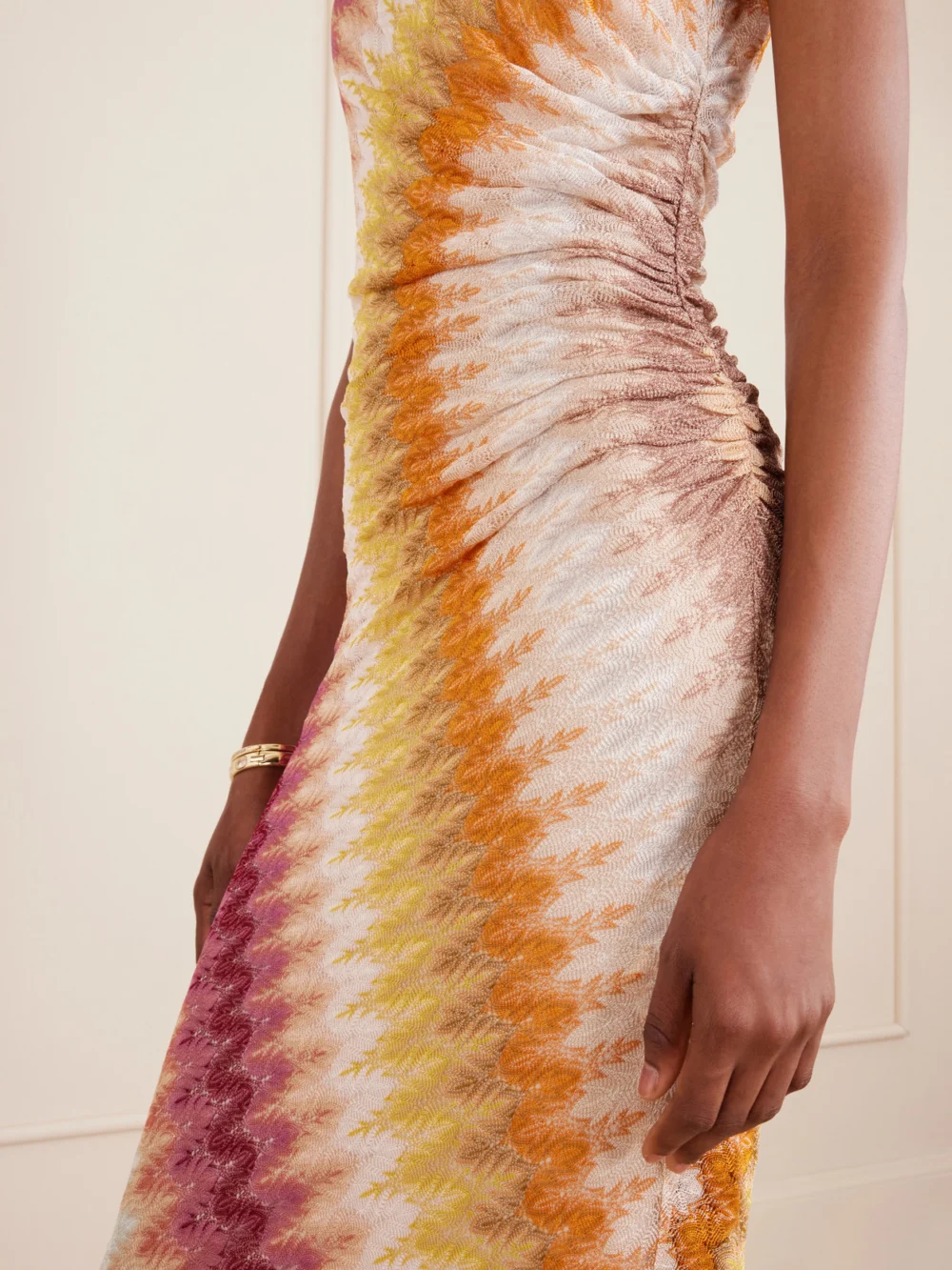 Close-up detail of the Missoni One-shoulder Striped Ruched Crochet-knit Maxi Dress