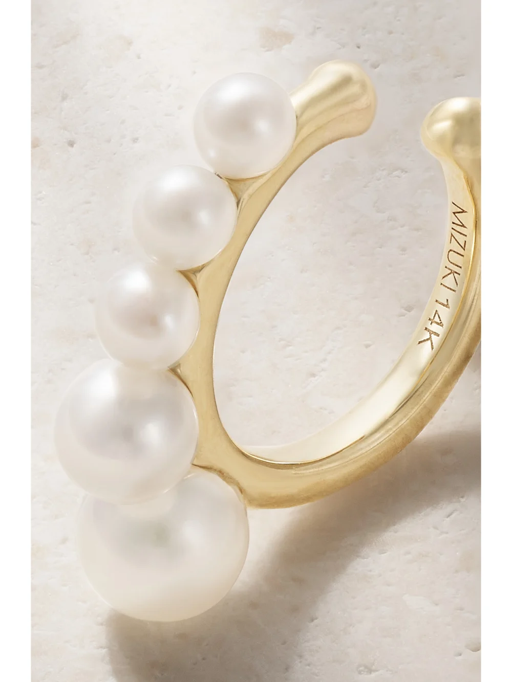 Close-up detail of the Mizuki 14-karat Gold Pearl Ear Cuff