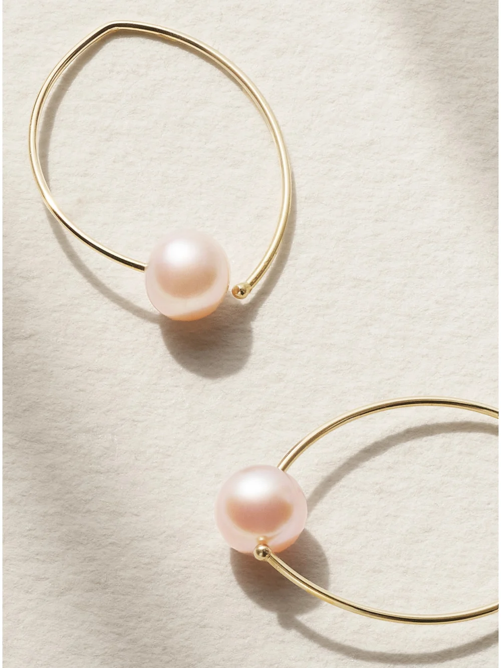 Close-up detail of the Mizuki 14-karat Gold Pearl Hoop Earrings