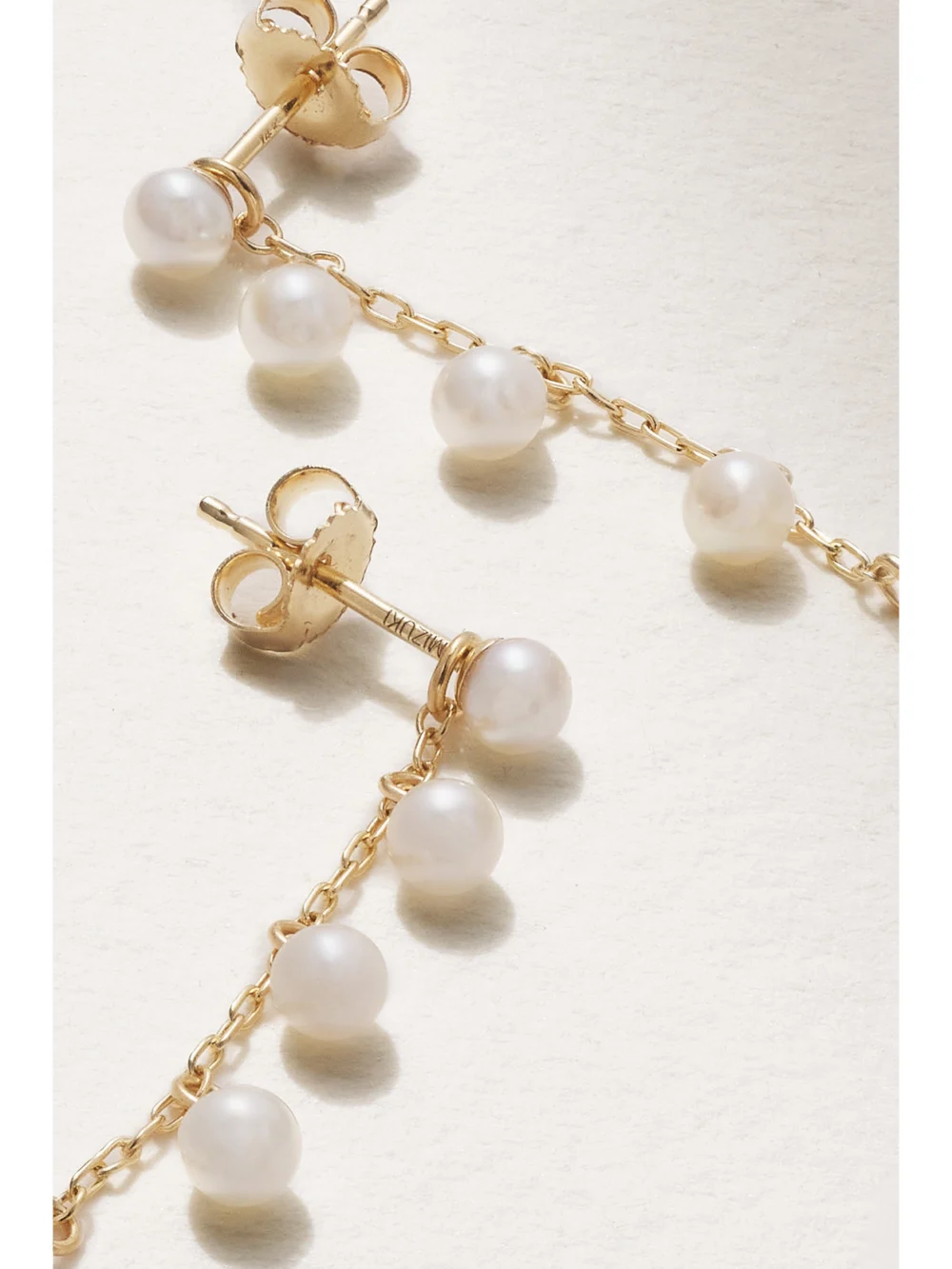 Close-up detail of the Mizuki Two Way 14-karat Gold Pearl Earrings