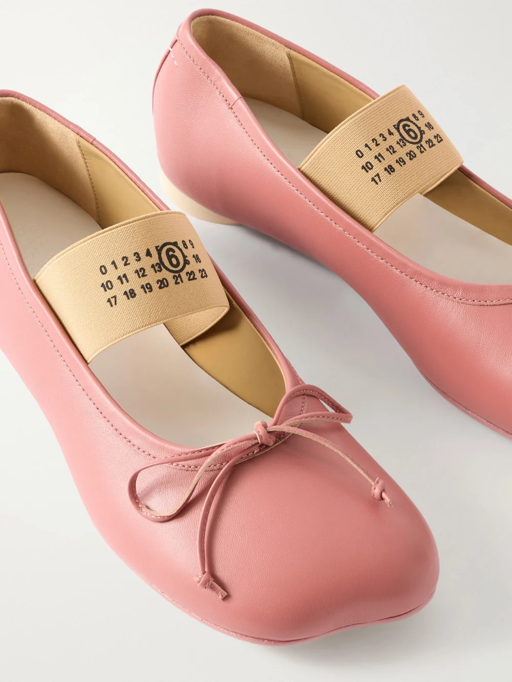 Close-up detail of the MM6 Maison Margiela Bow-detailed Leather Ballet Flats