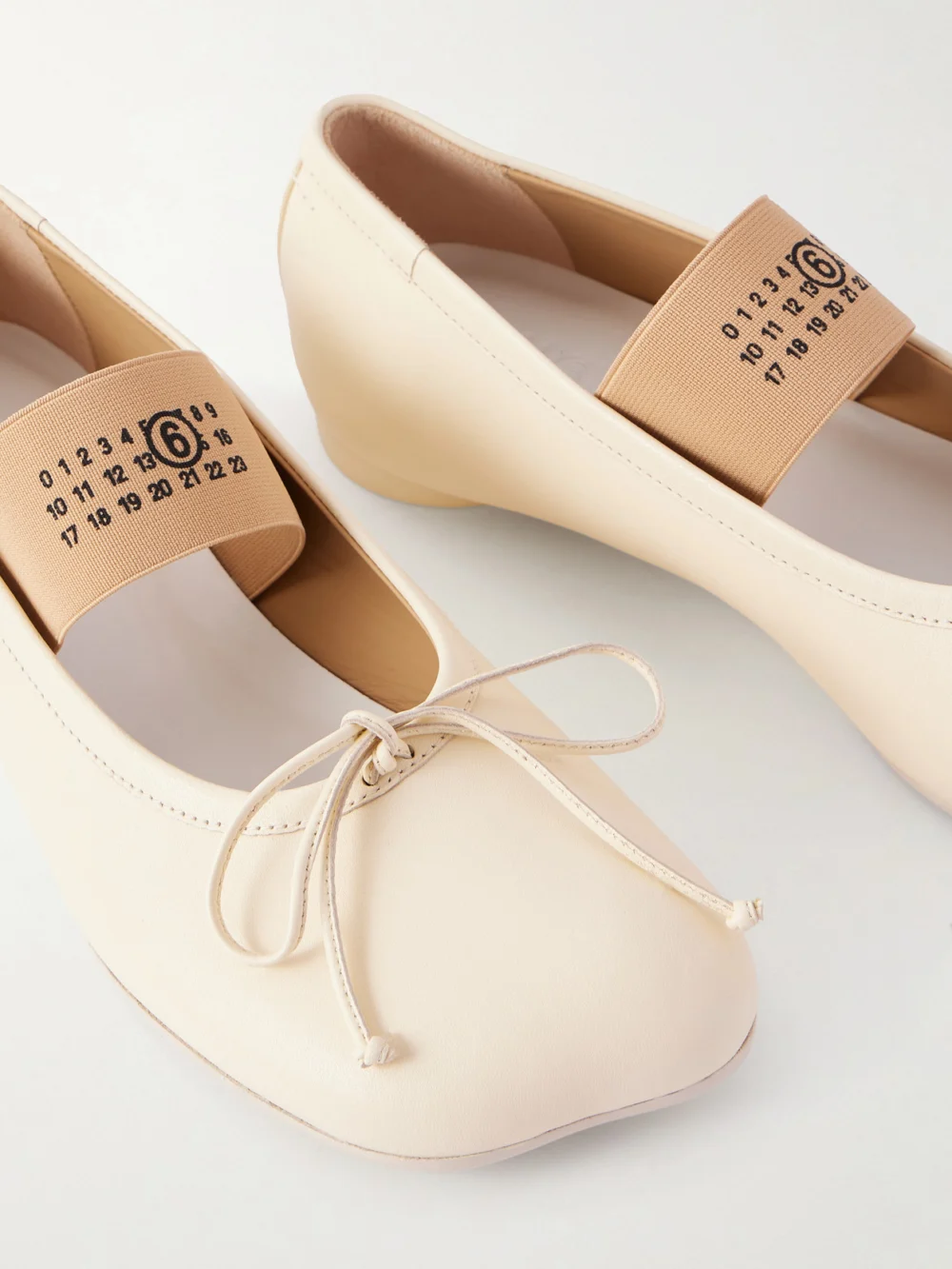 Close-up detail of the MM6 Maison Margiela Bow-detailed Leather Ballet Flats