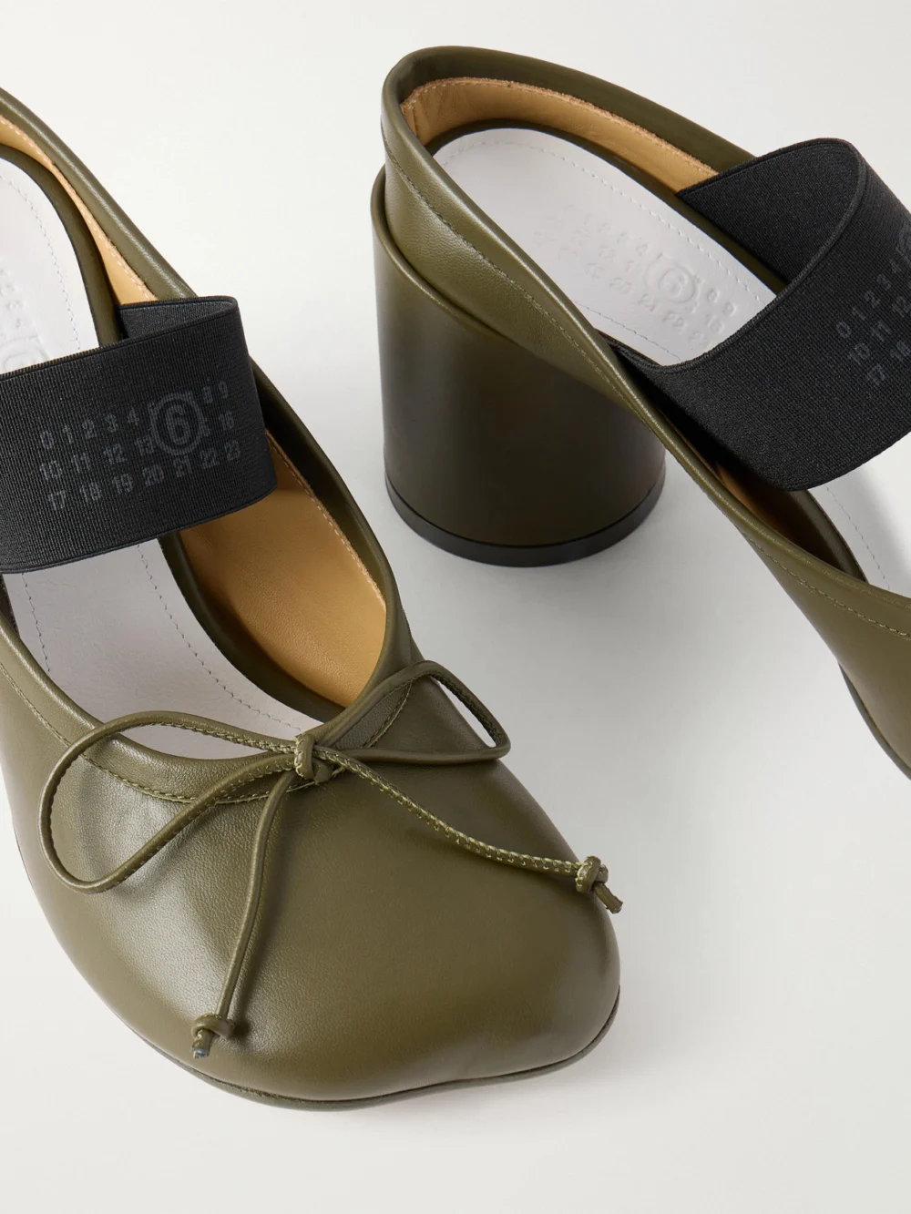 Close-up detail of the MM6 Maison Margiela Bow-embellished Leather Pumps