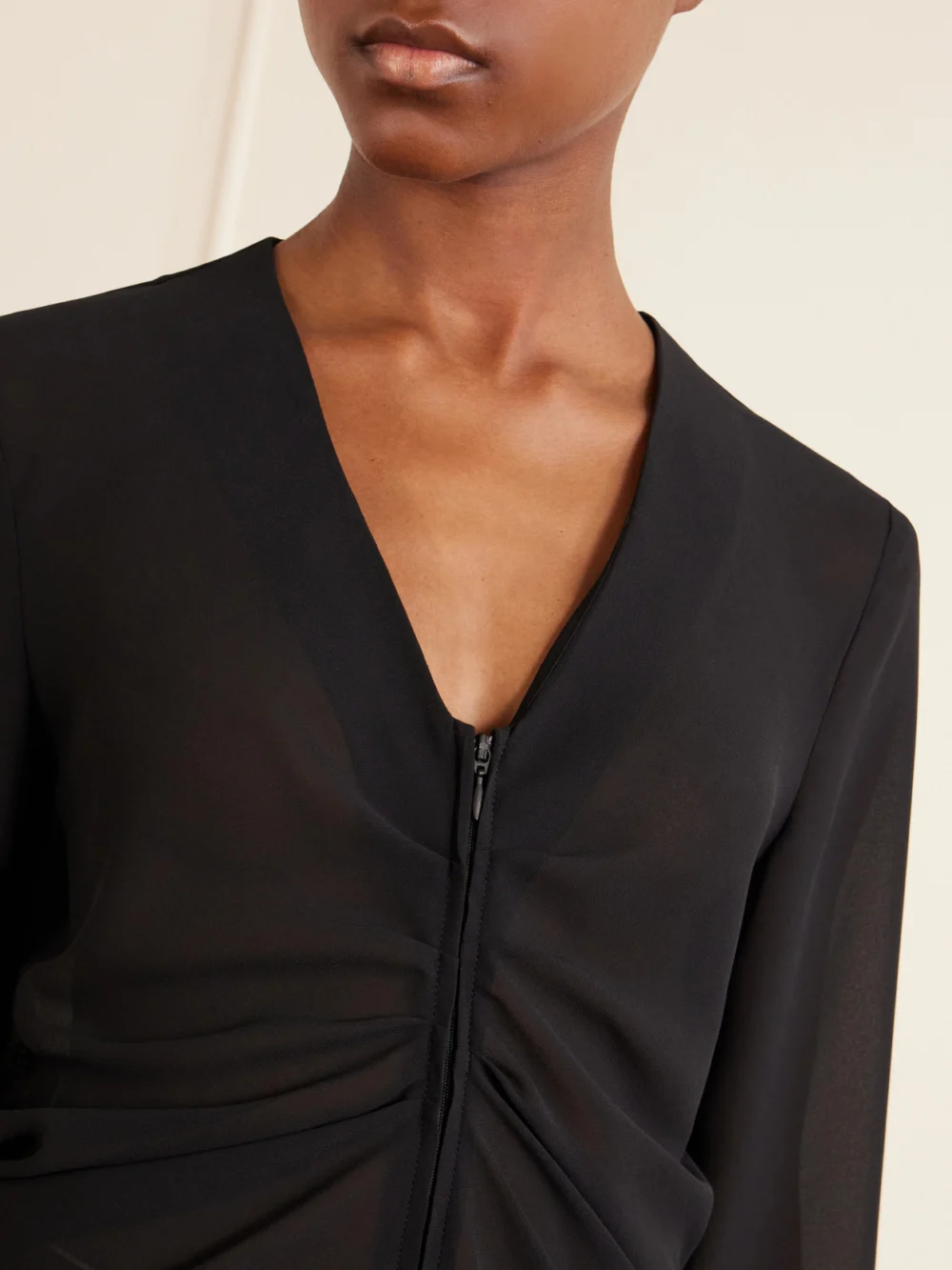 Close-up detail of the MM6 Maison Margiela Jersey Zip-up Blouse
