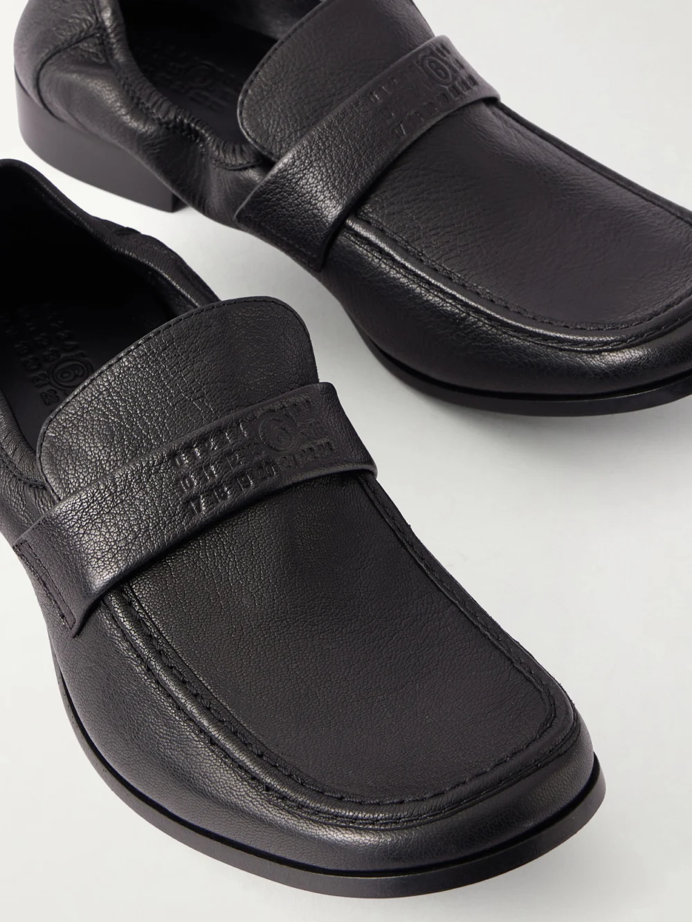 Close-up detail of the MM6 Maison Margiela Leather Penny Loafers