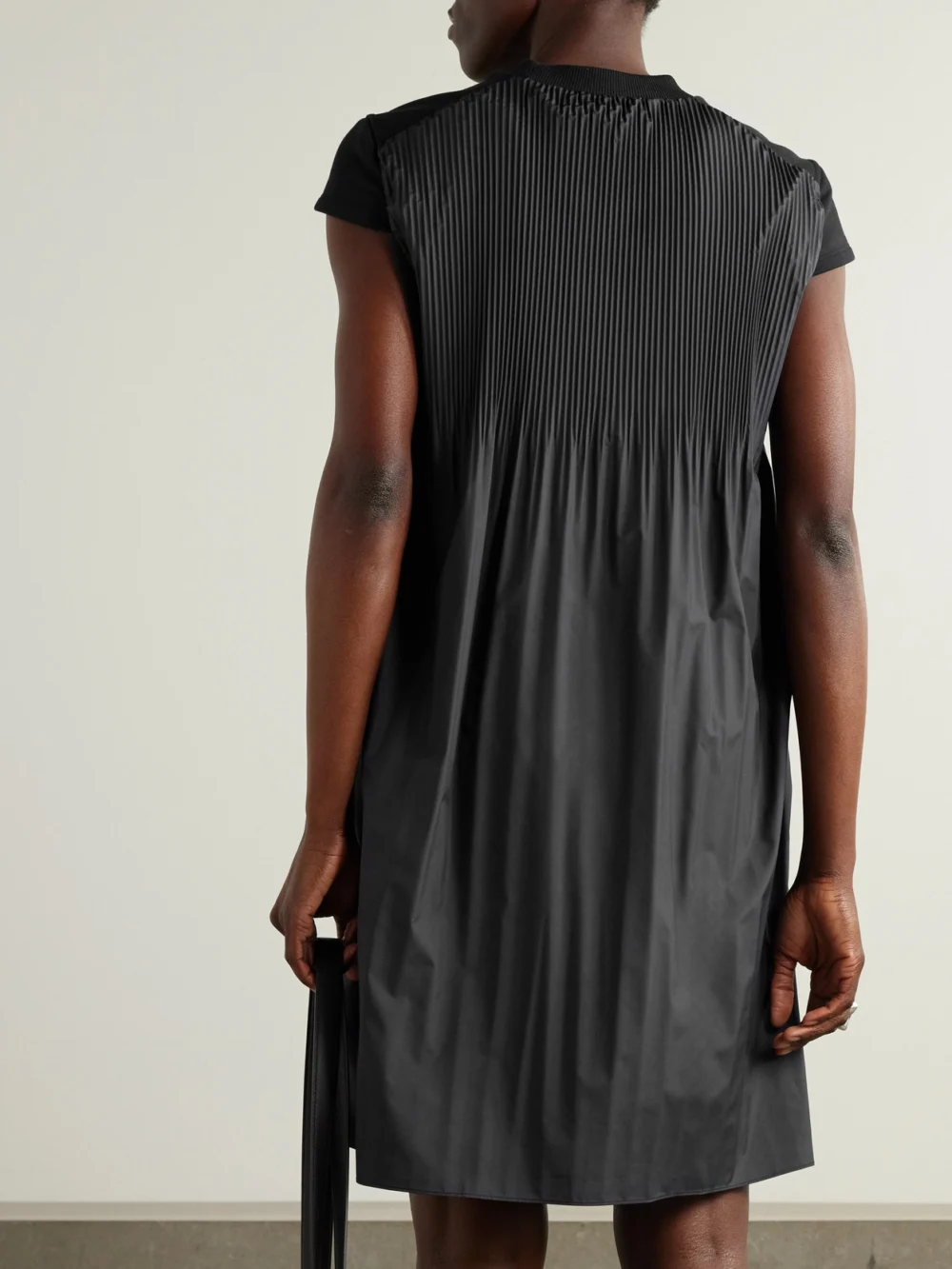 Back view of the Moncler Appliquéd Cotton-jersey and Pleated Shell Mini Dress