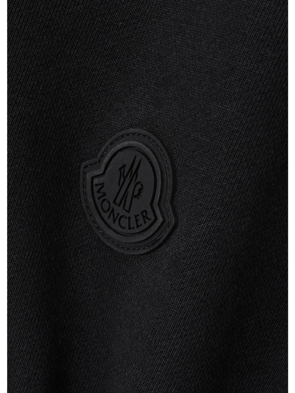 Close-up detail of the Moncler Appliquéd Cotton-jersey and Pleated Shell Mini Dress