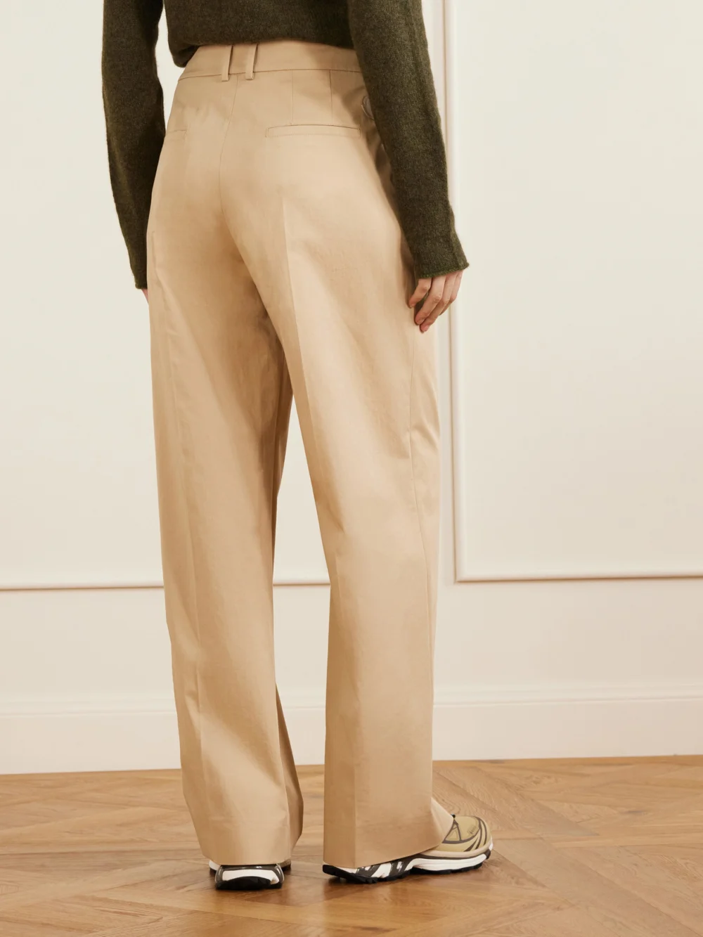 Back view of the Moncler Appliquéd Pleated Cotton-twill Wide-leg Pants