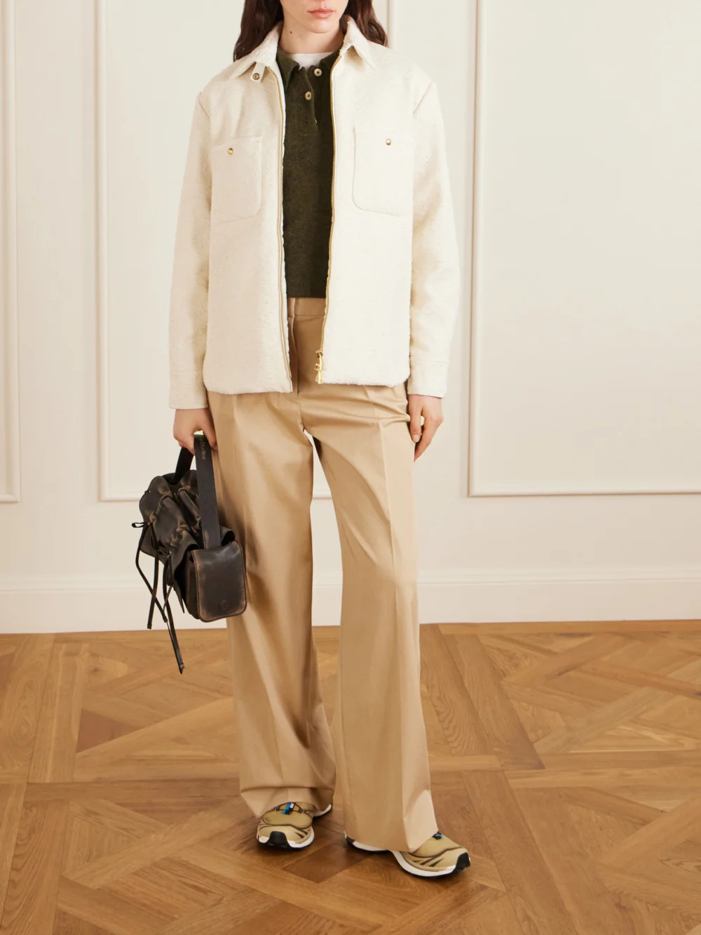Moncler Appliquéd Pleated Cotton-twill Wide-leg Pants, worn by a model