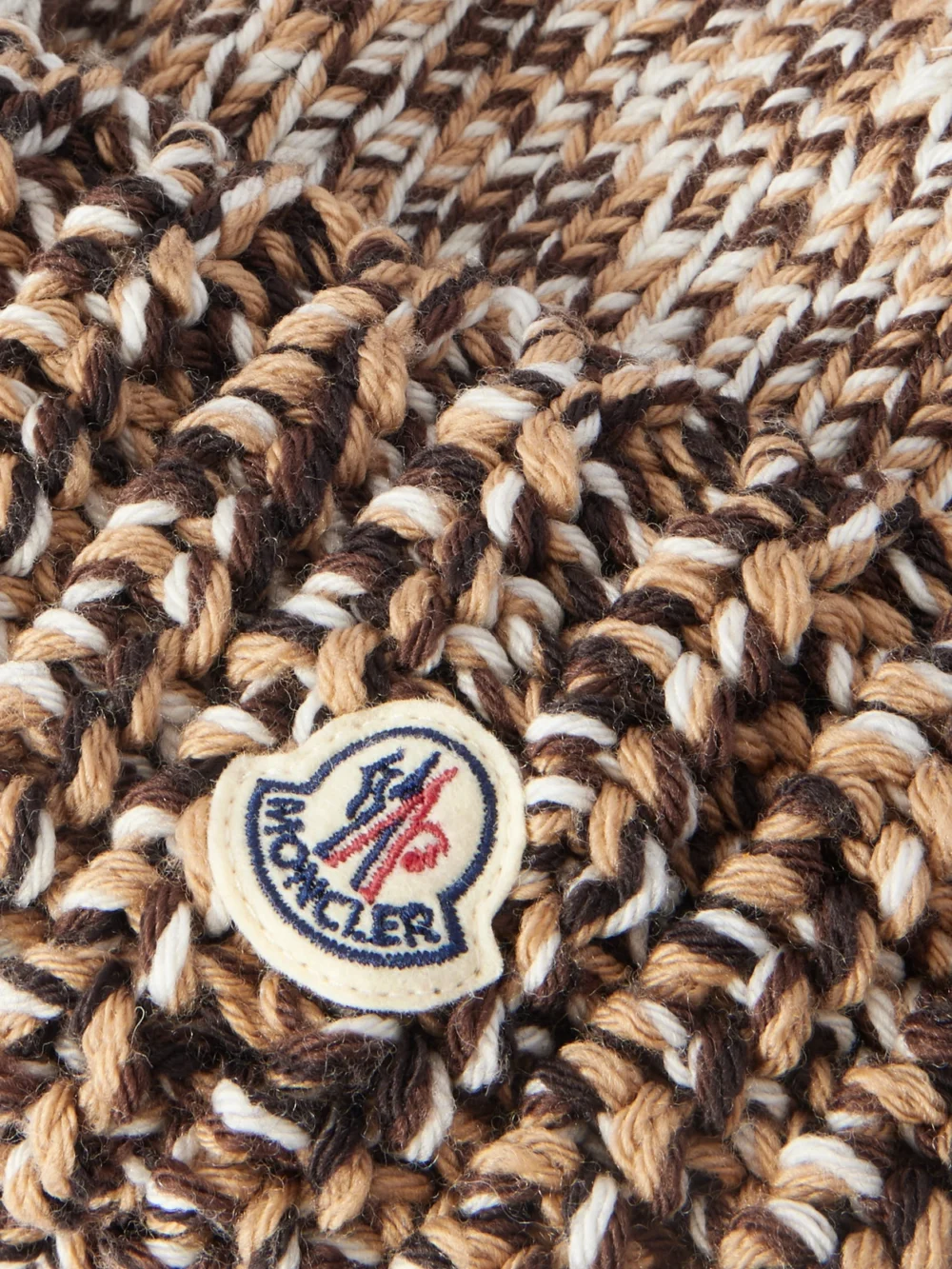 Close-up detail of the Moncler Appliquéd Ribbed Wool Beanie