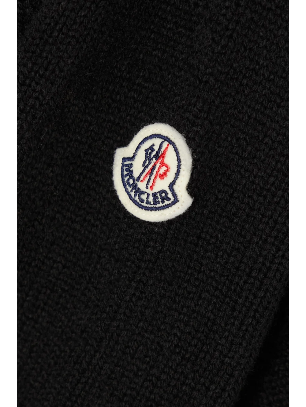 Close-up detail of the Moncler Appliquéd Striped Wool and Cashmere-blend Sweater