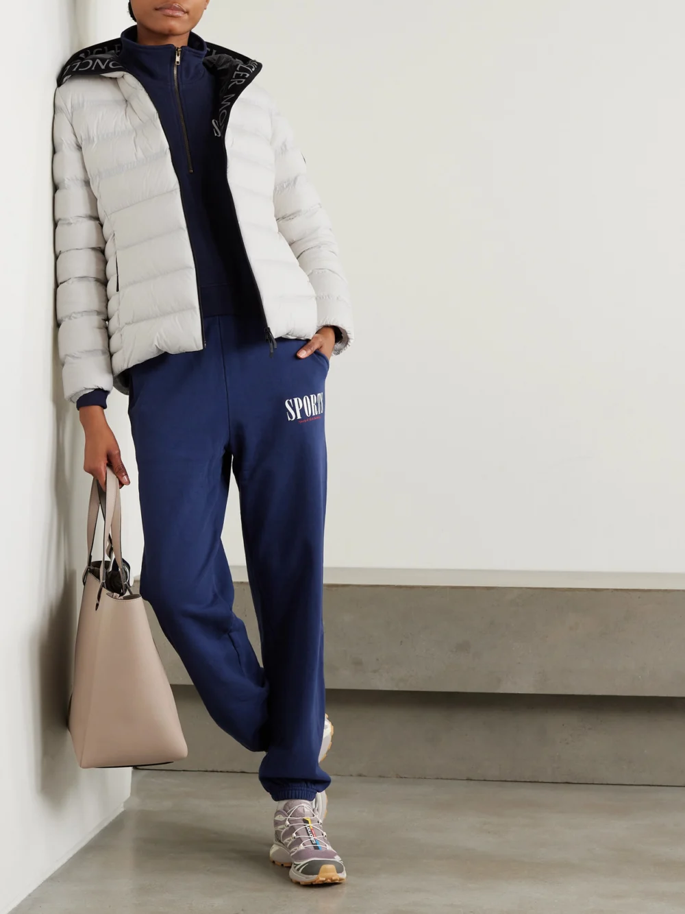Moncler Appliquéd Webbing-trimmed Quilted Shell Down Jacket, worn by a model