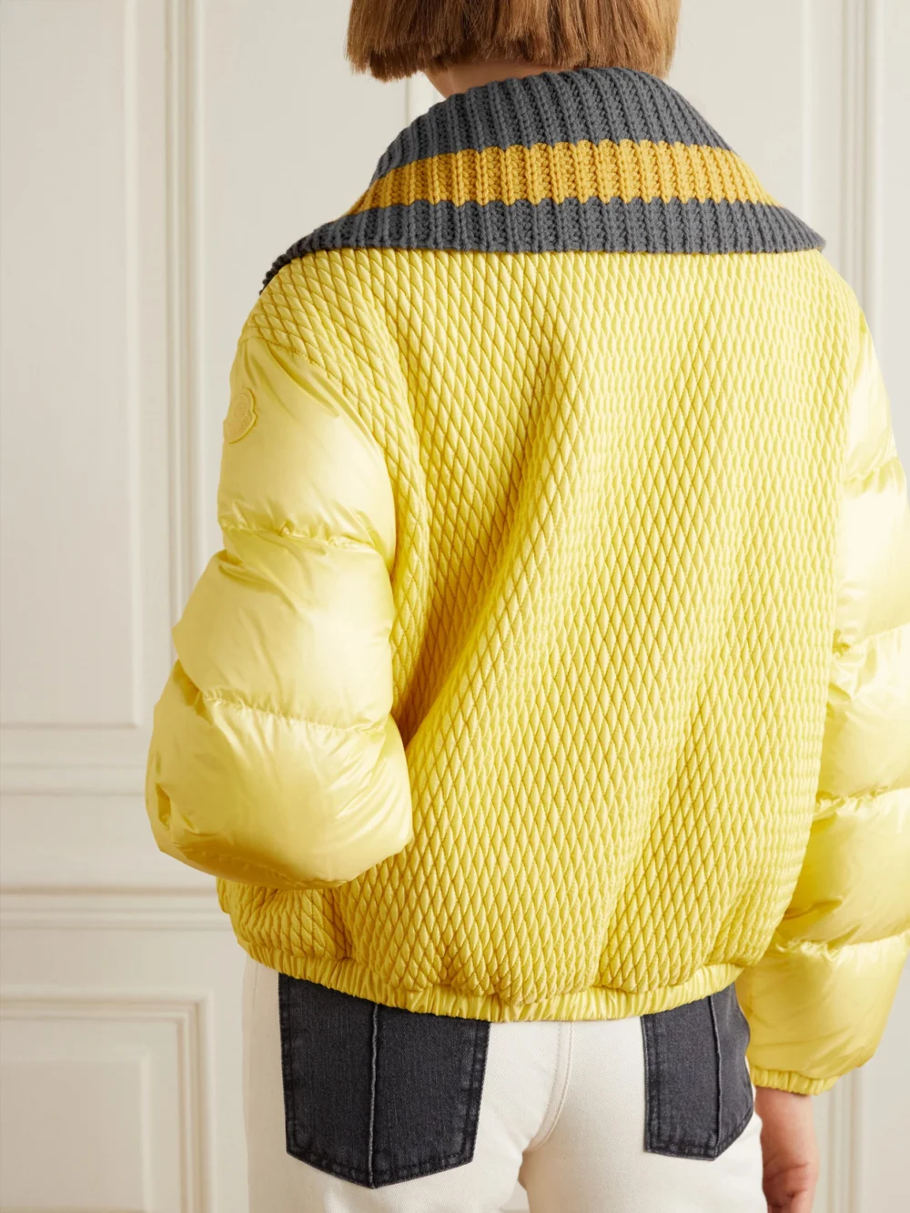 Back view of the Moncler Apront Cropped Quilted Shell Down Bomber Jacket