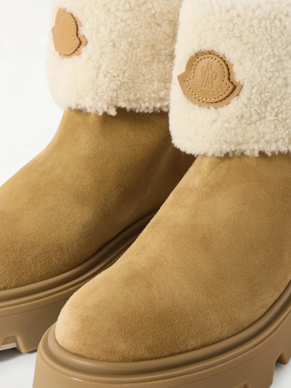 Close-up detail of the Moncler Aurea Appliquéd Shearling-trimmed Suede Ankle Boots