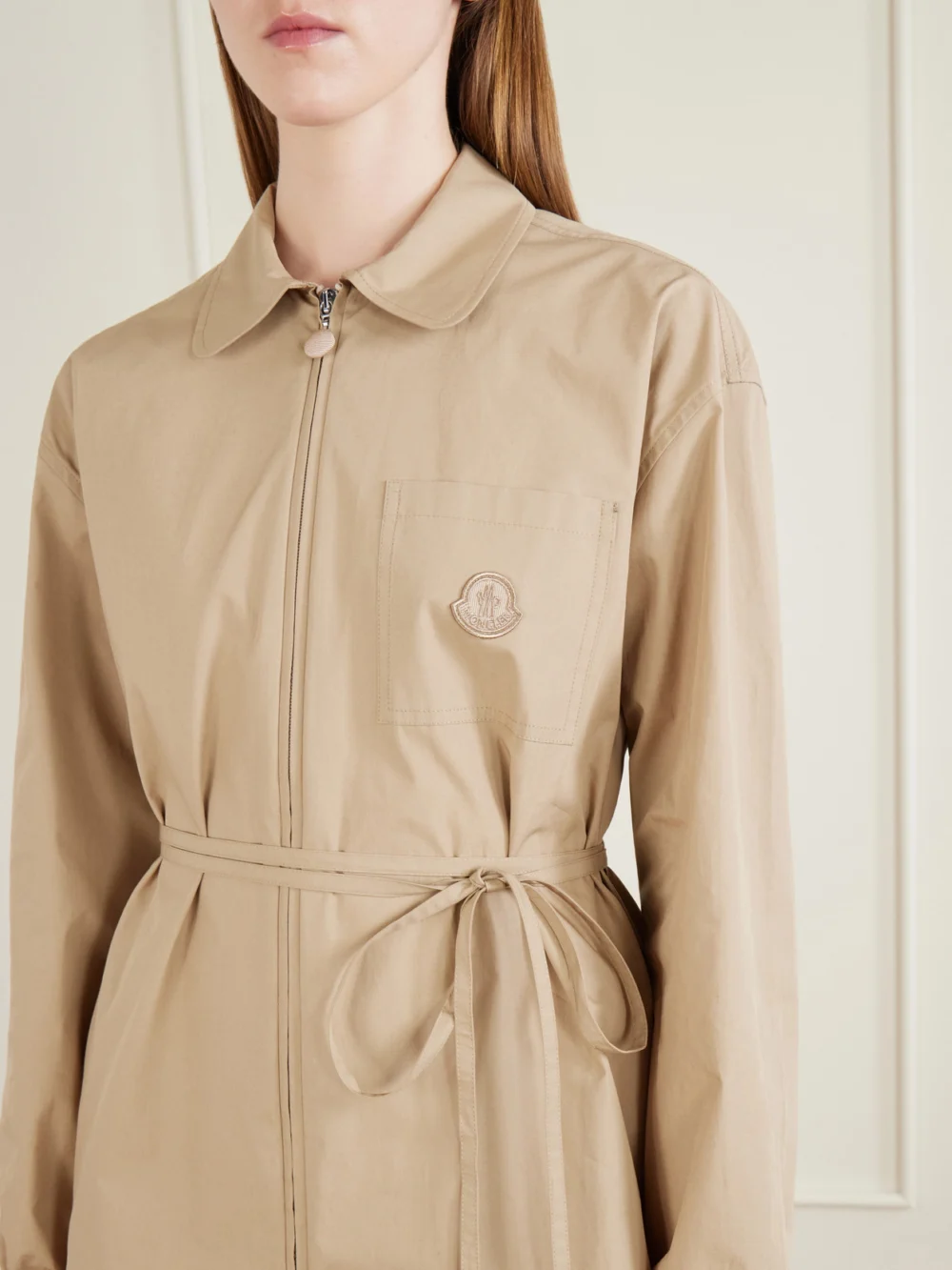 Close-up detail of the Moncler Belted Appliquéd Cotton-poplin Zip-up Shirt