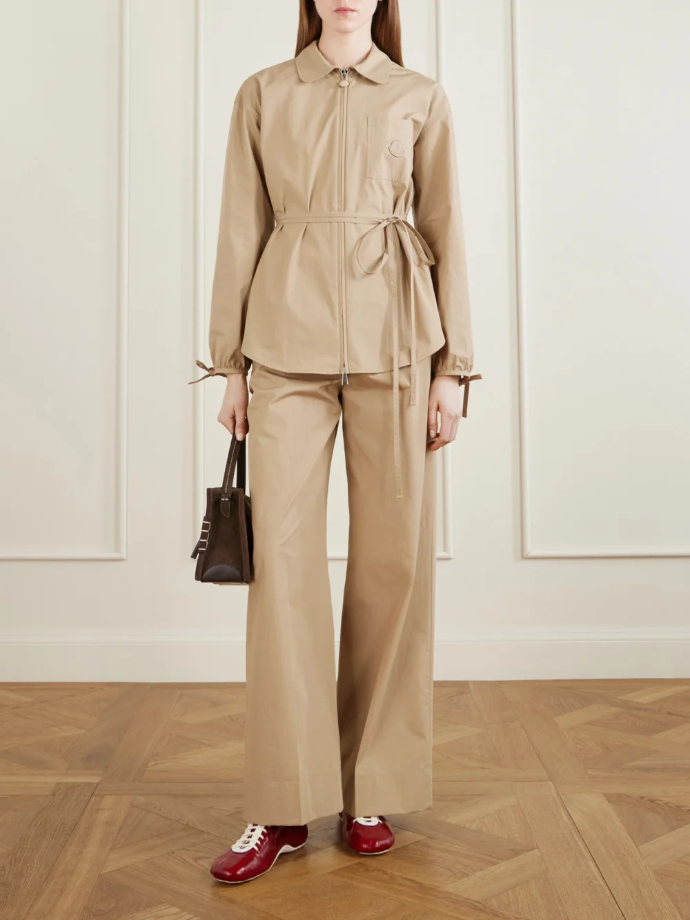 Moncler Belted Appliquéd Cotton-poplin Zip-up Shirt, worn by a model