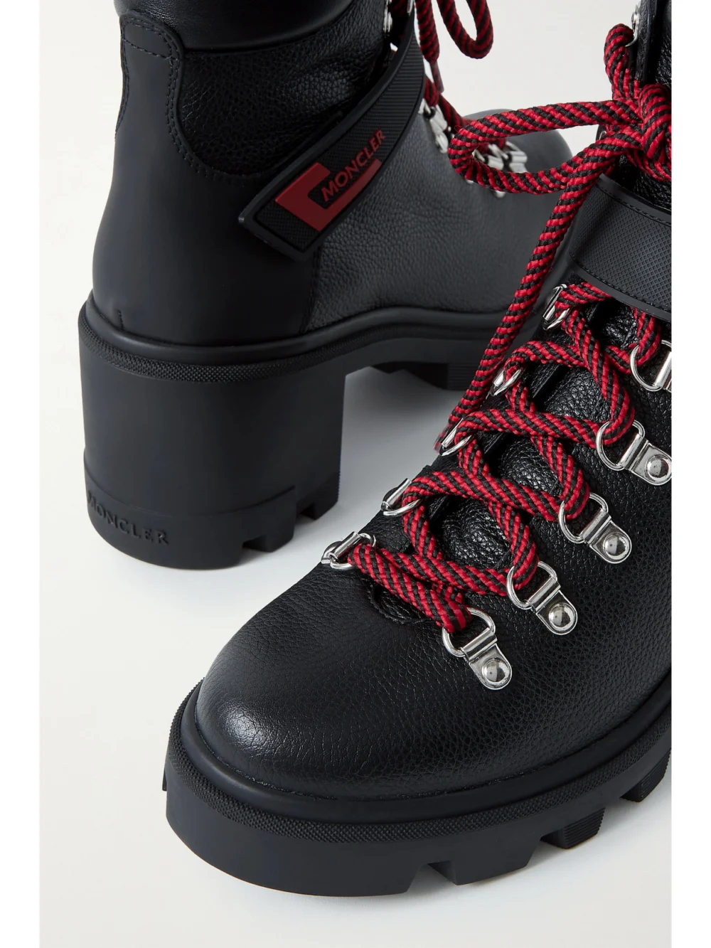 Close-up detail of the Moncler Carol Rubber-trimmed Textured-leather Ankle Boots