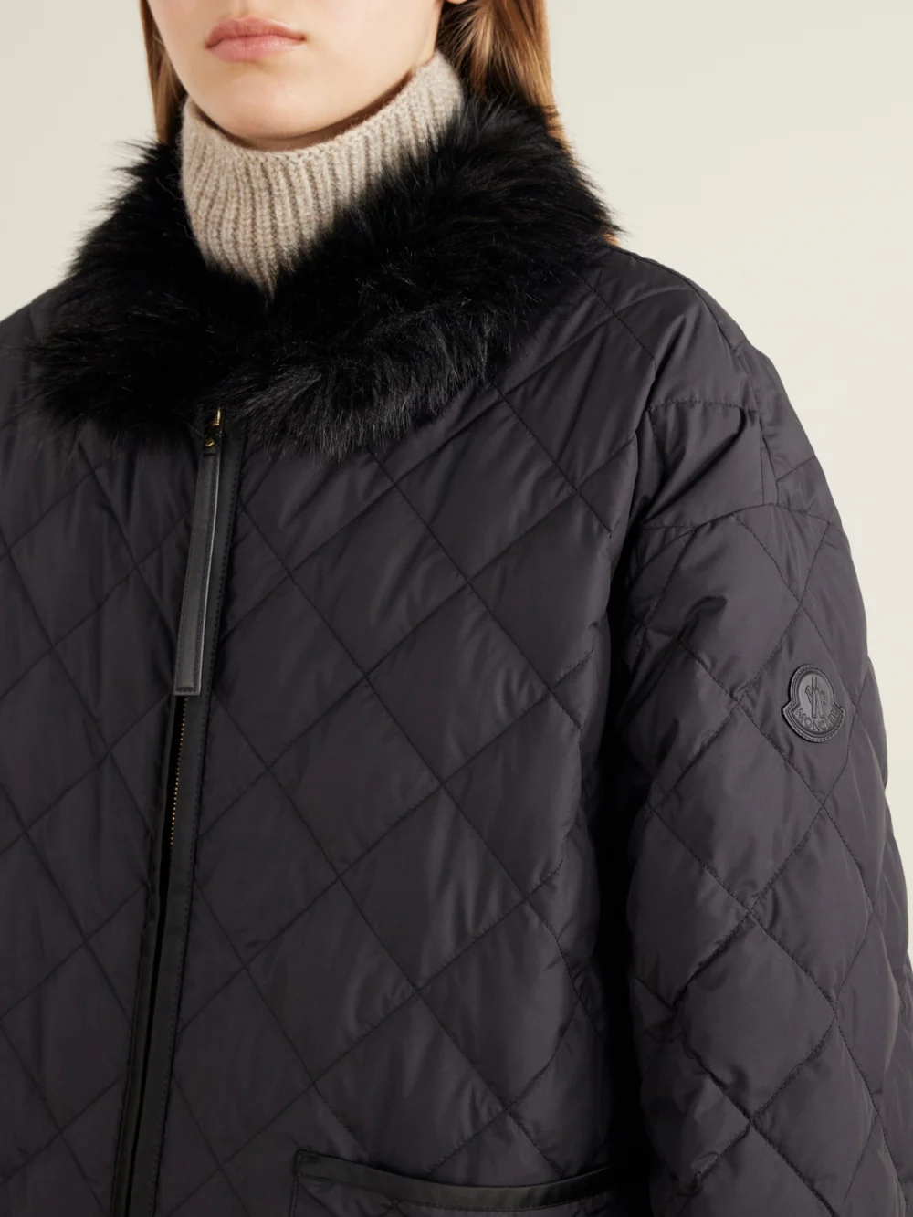 Close-up detail of the Moncler Chaleureux Plush-trimmed Shell Quilted Down Jacket