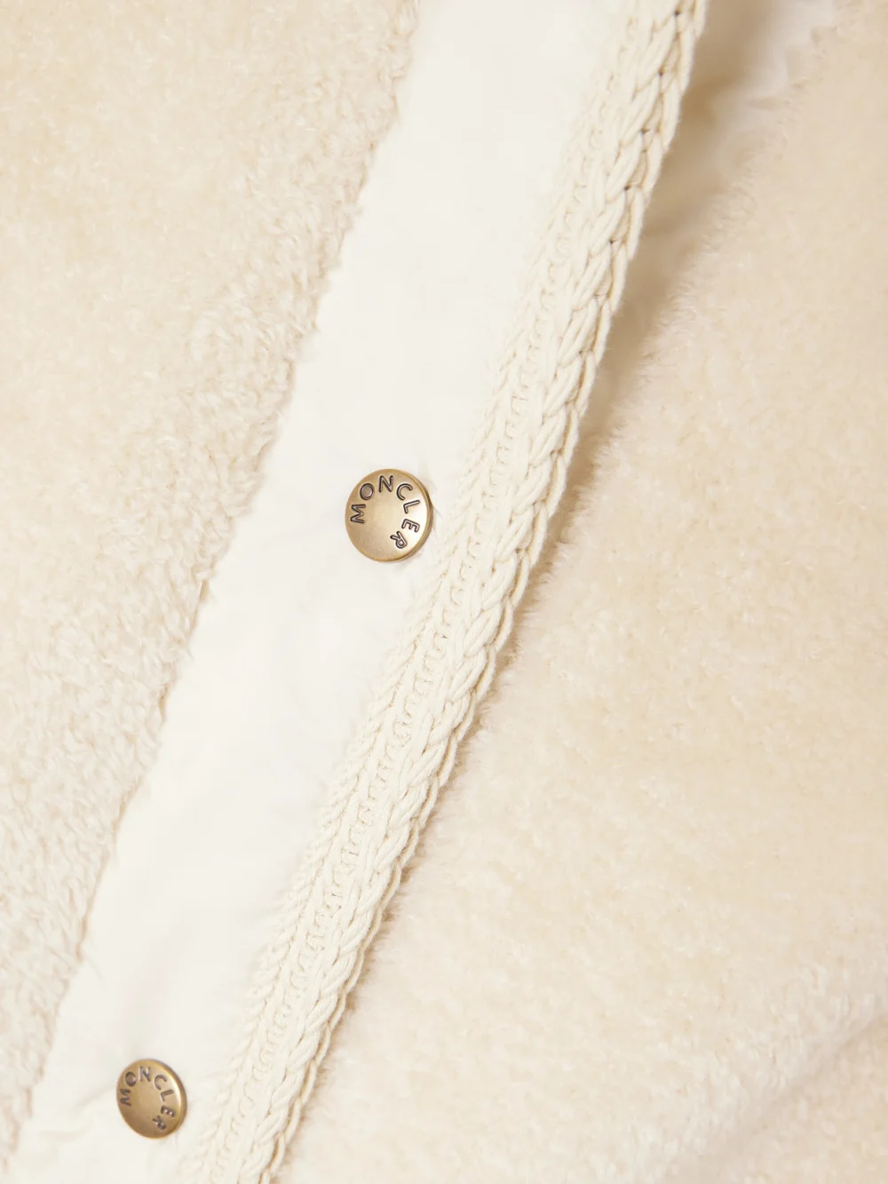 Close-up detail of the Moncler Ciboulette Hooded Shell-trimmed Plush Down Jacket