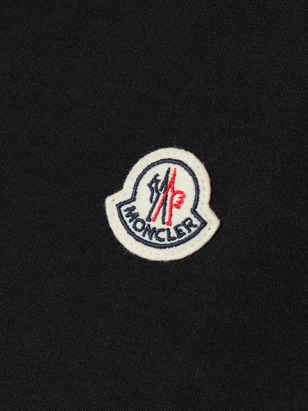 Close-up detail of the Moncler Cotton-blend Jersey Mini Dress
