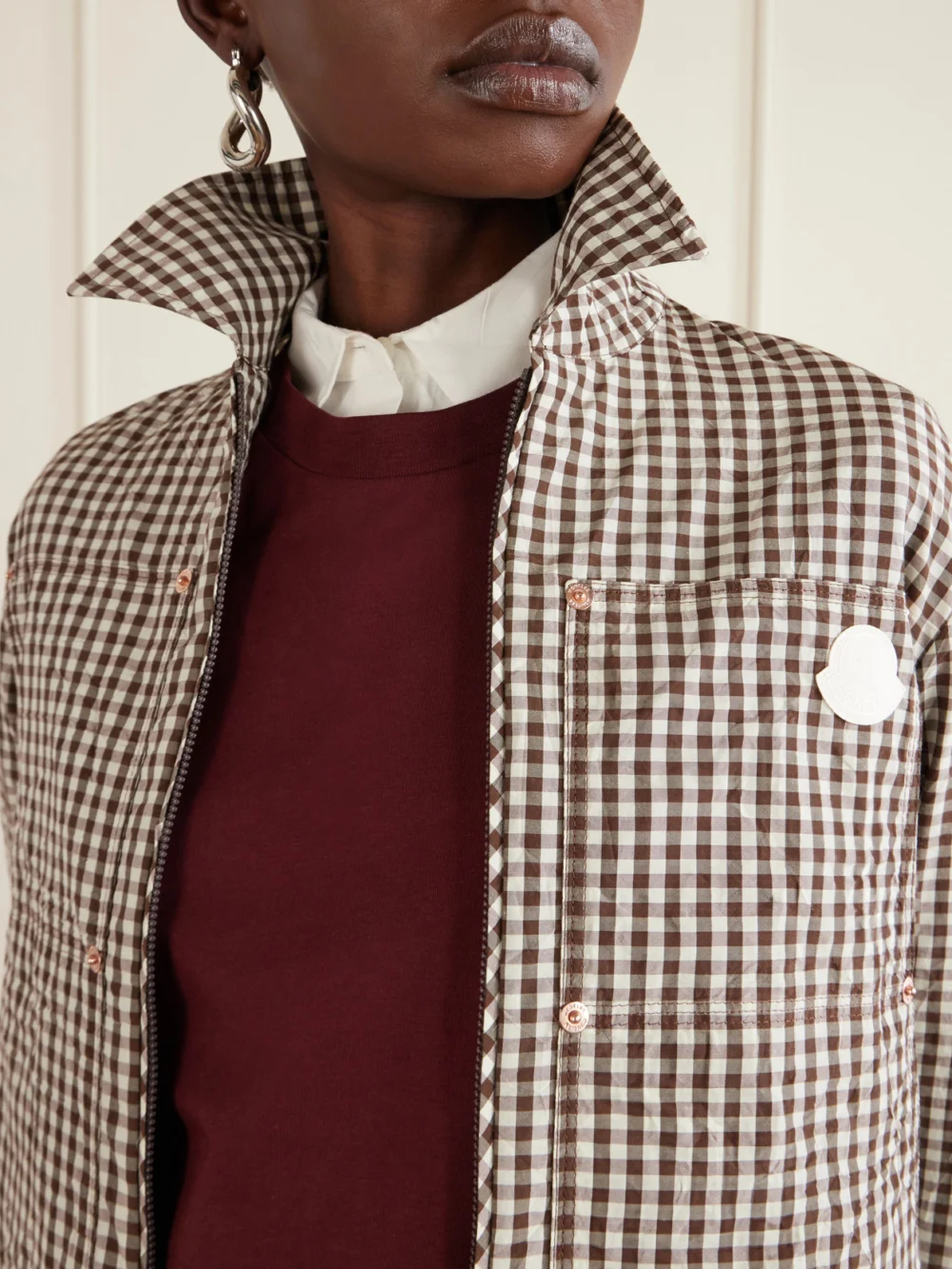 Close-up detail of the Moncler Cropped Appliquéd Gingham Cotton-blend Shirt