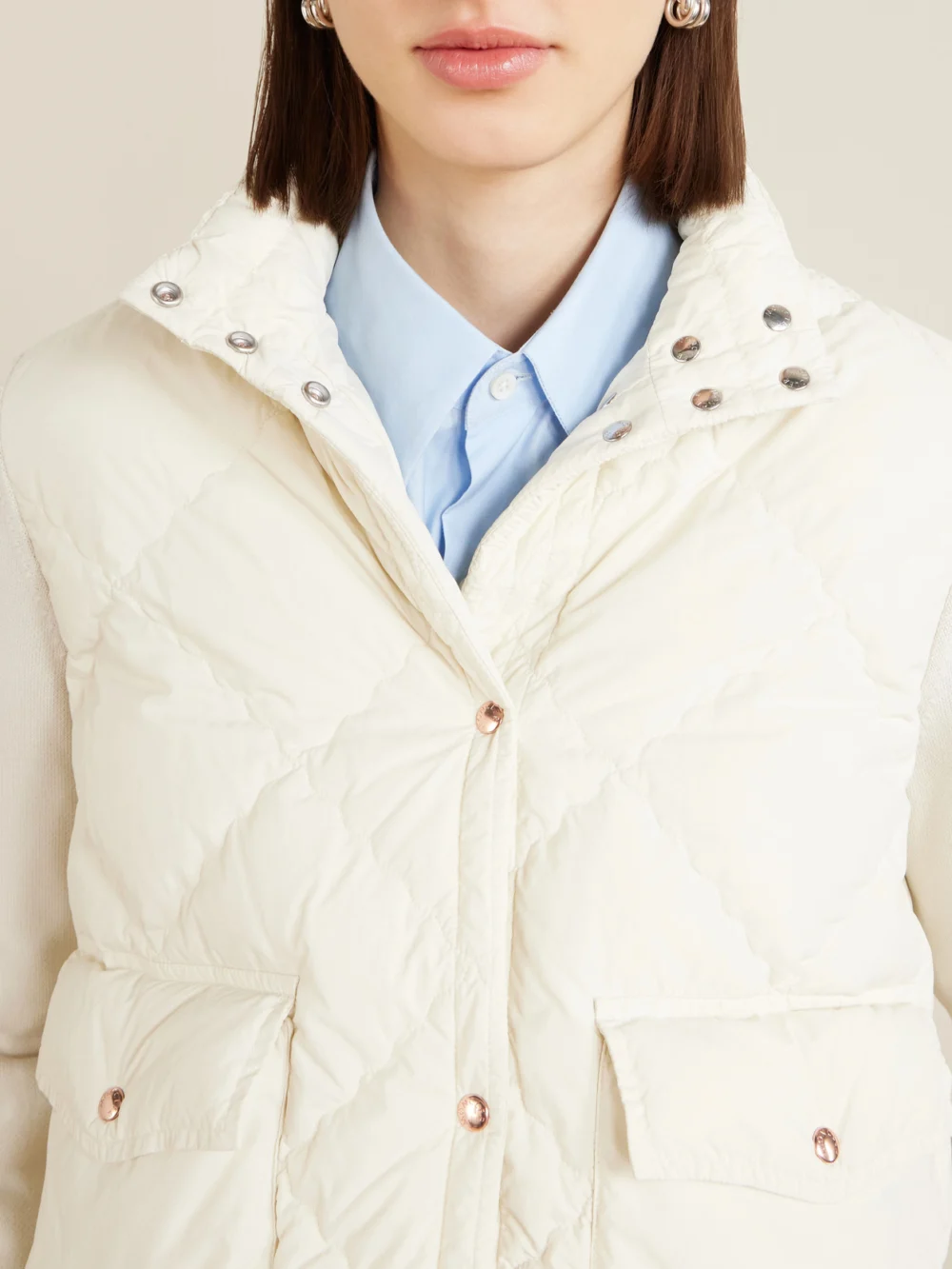 Close-up detail of the Moncler Cropped Knitted and Padded Quilted Shell Down Cardigan
